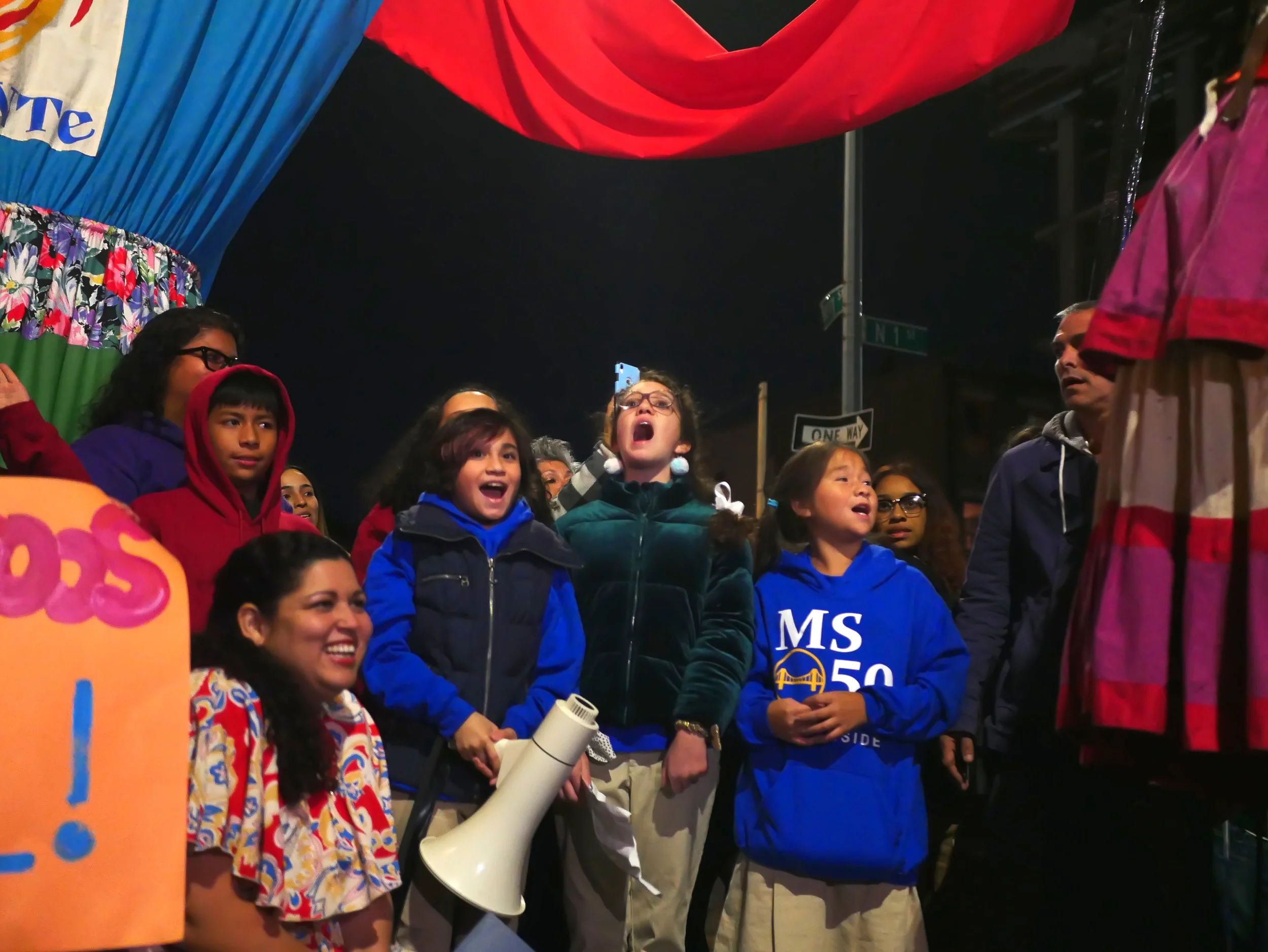 students sing together to Amal