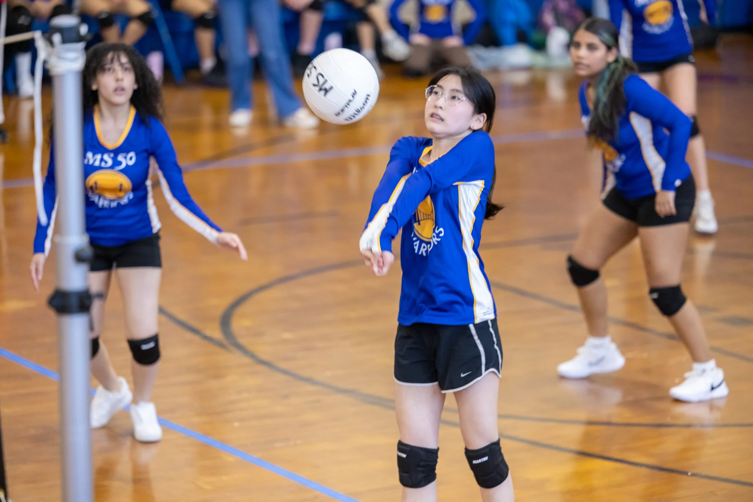 MS 50 students playing volleyball