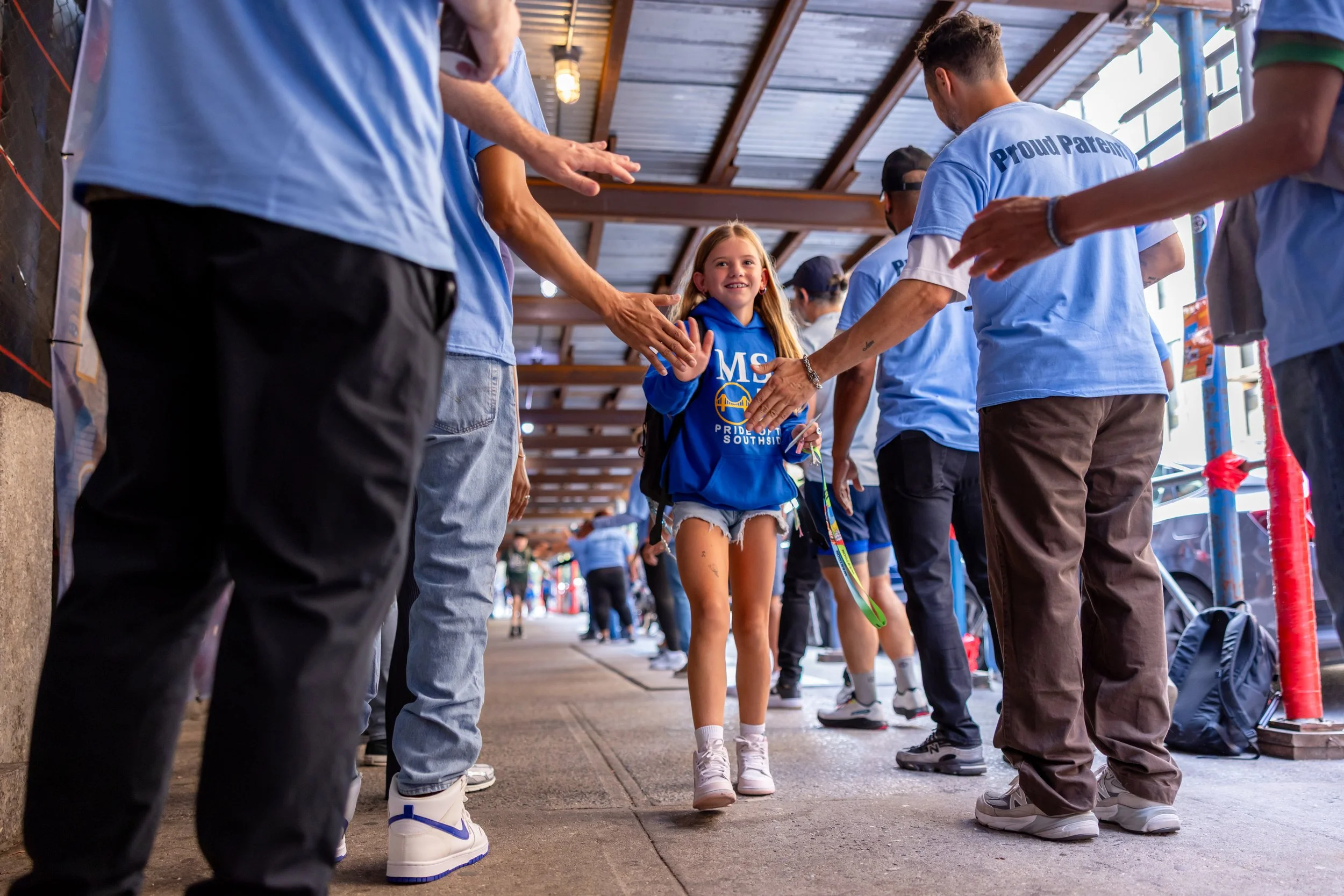 Students get high fives from parents