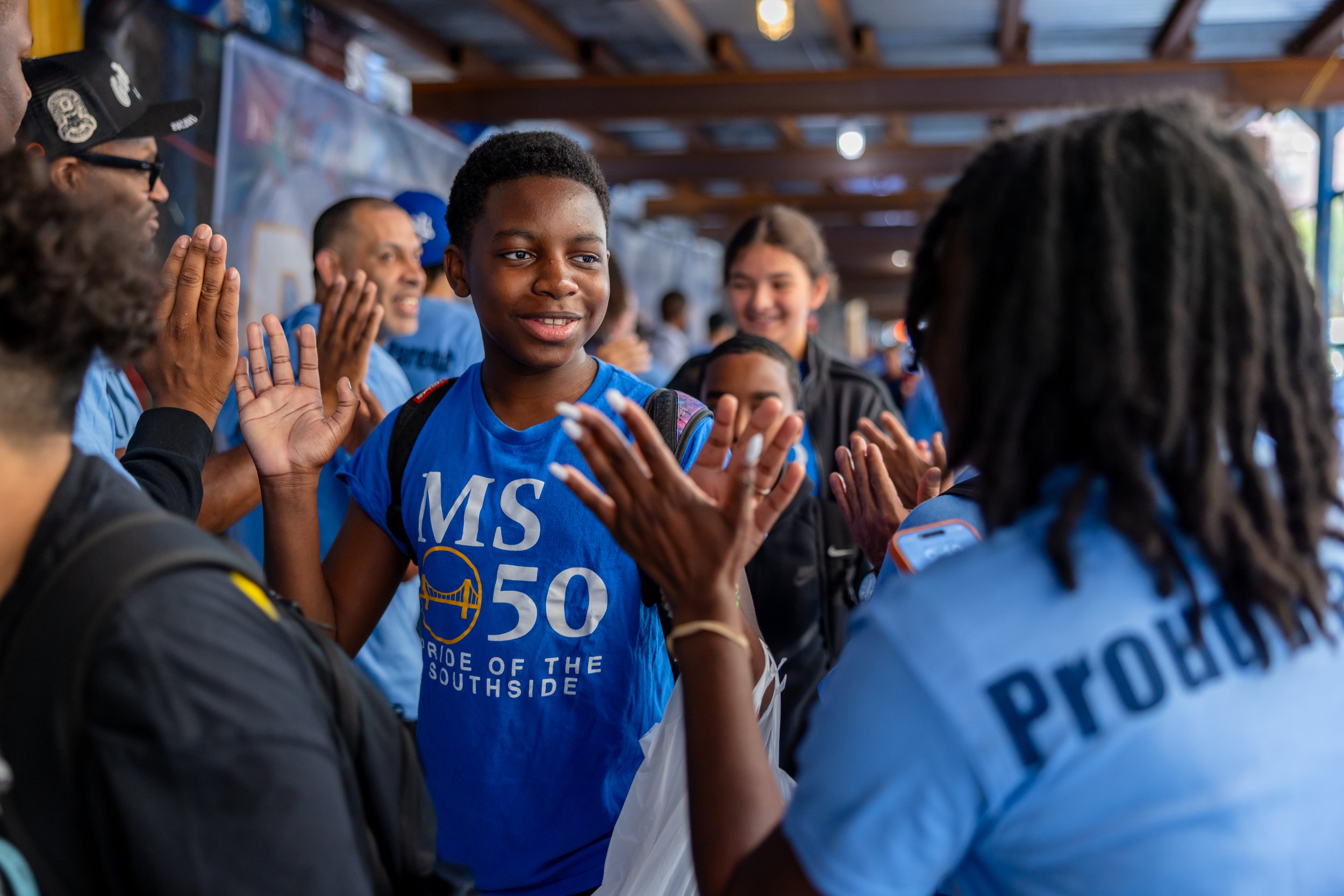 Students get high fives from parents