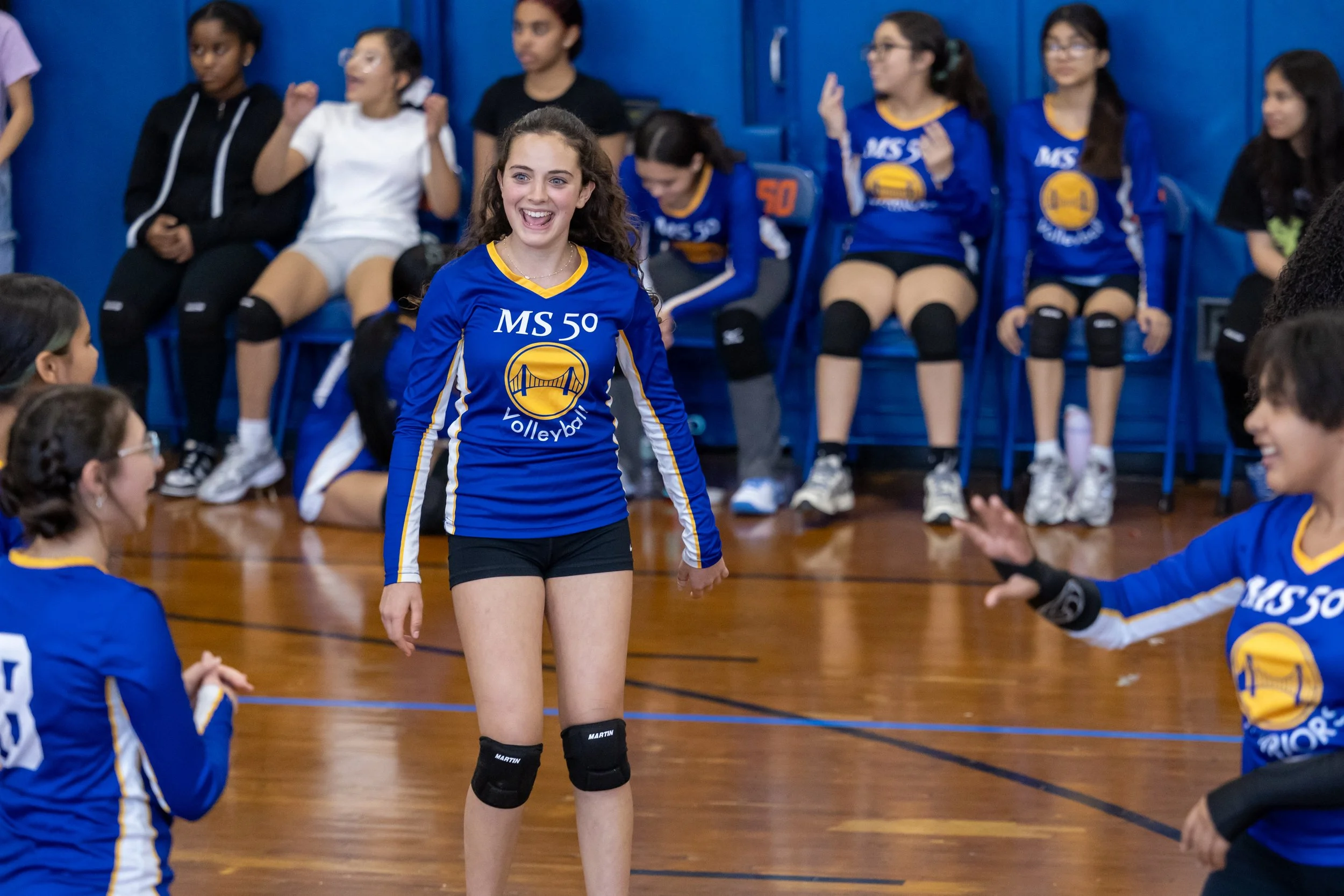 MS 50 students playing volleyball