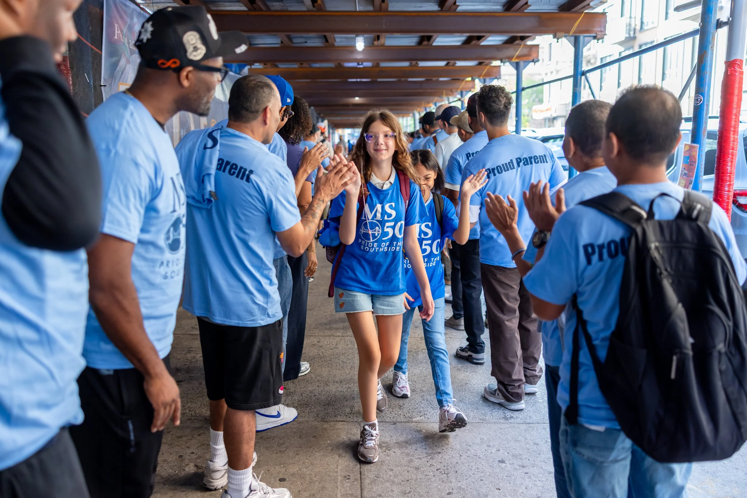 Students get high fives from parents