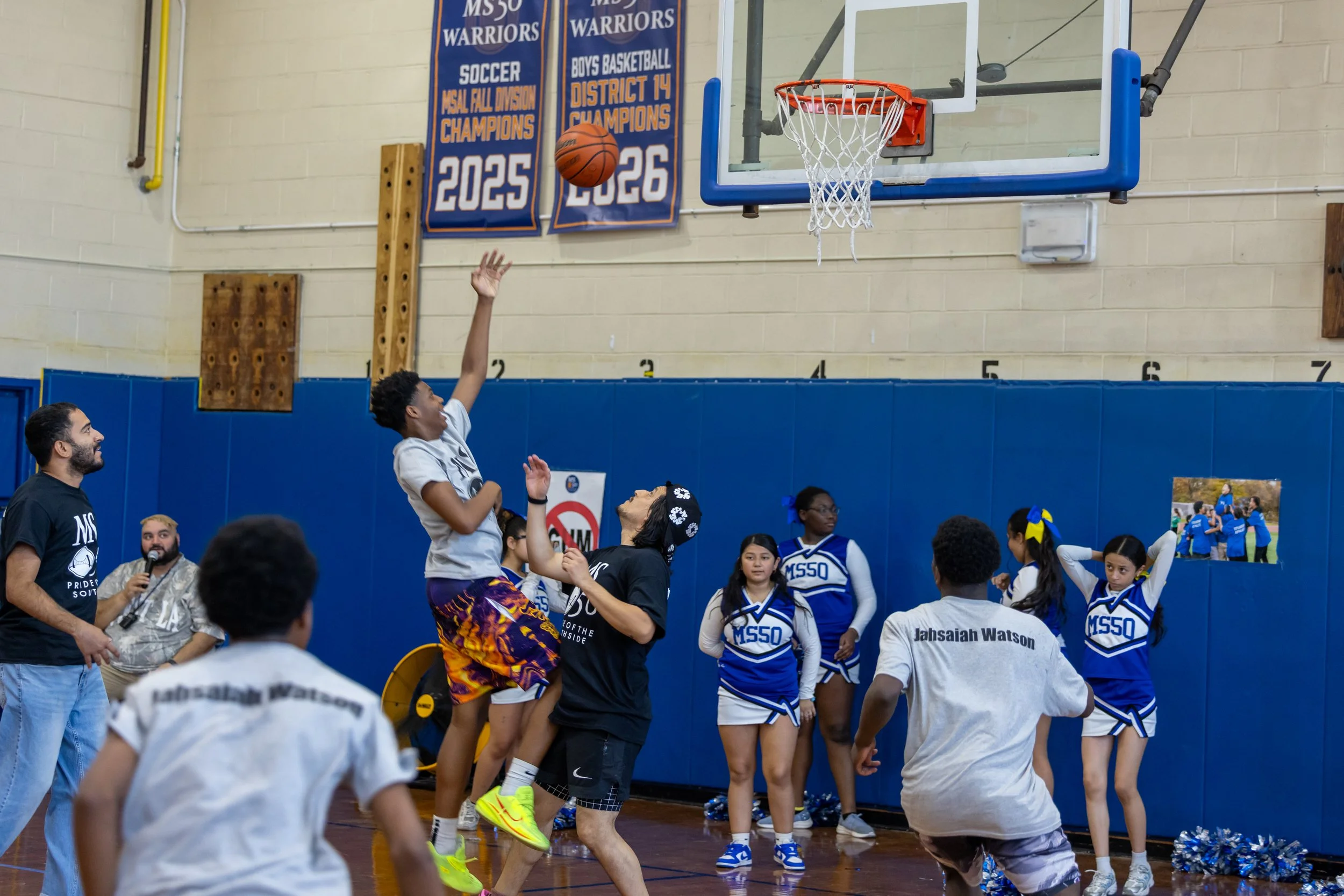 student versus staff basketball game