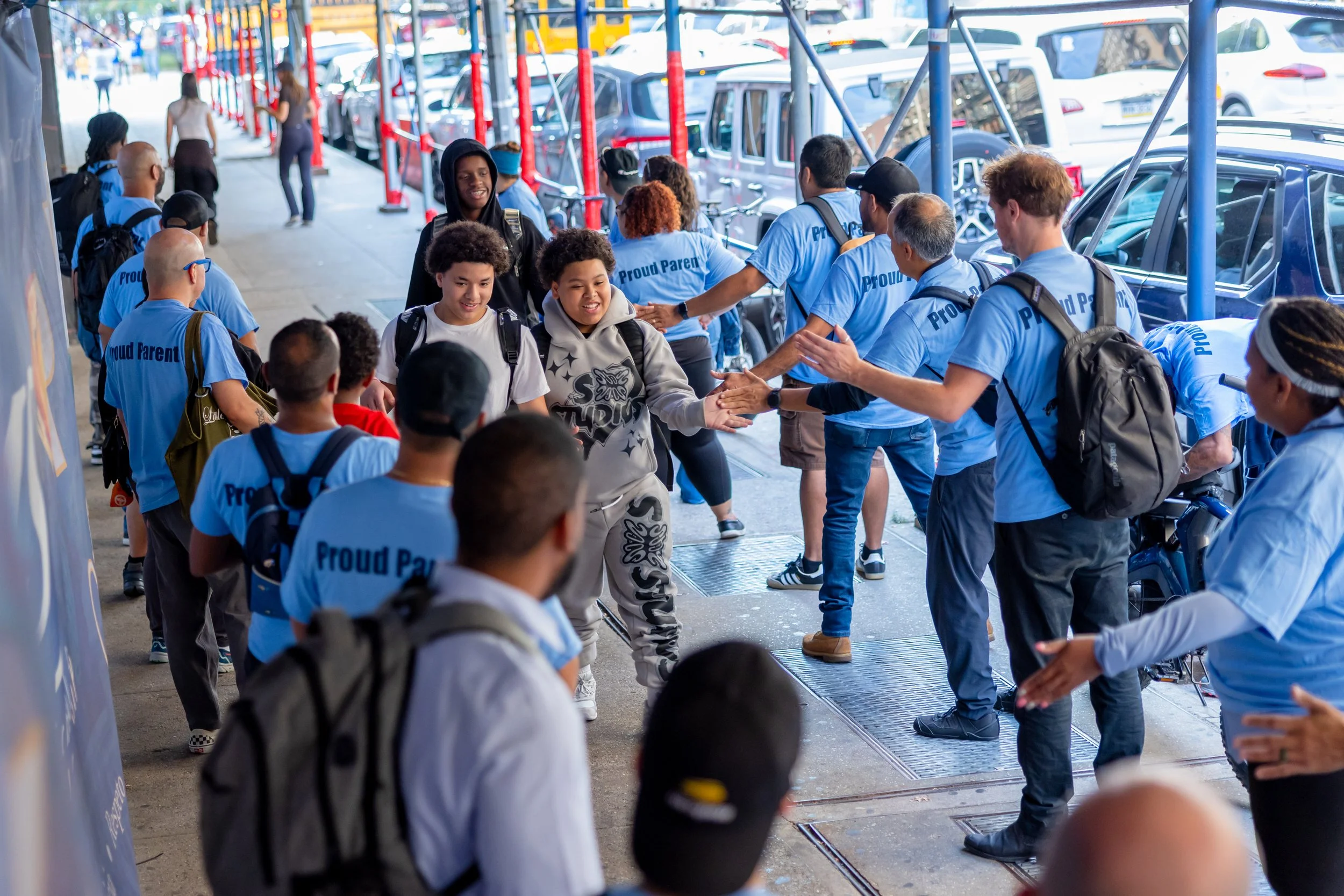 Students get high fives from parents