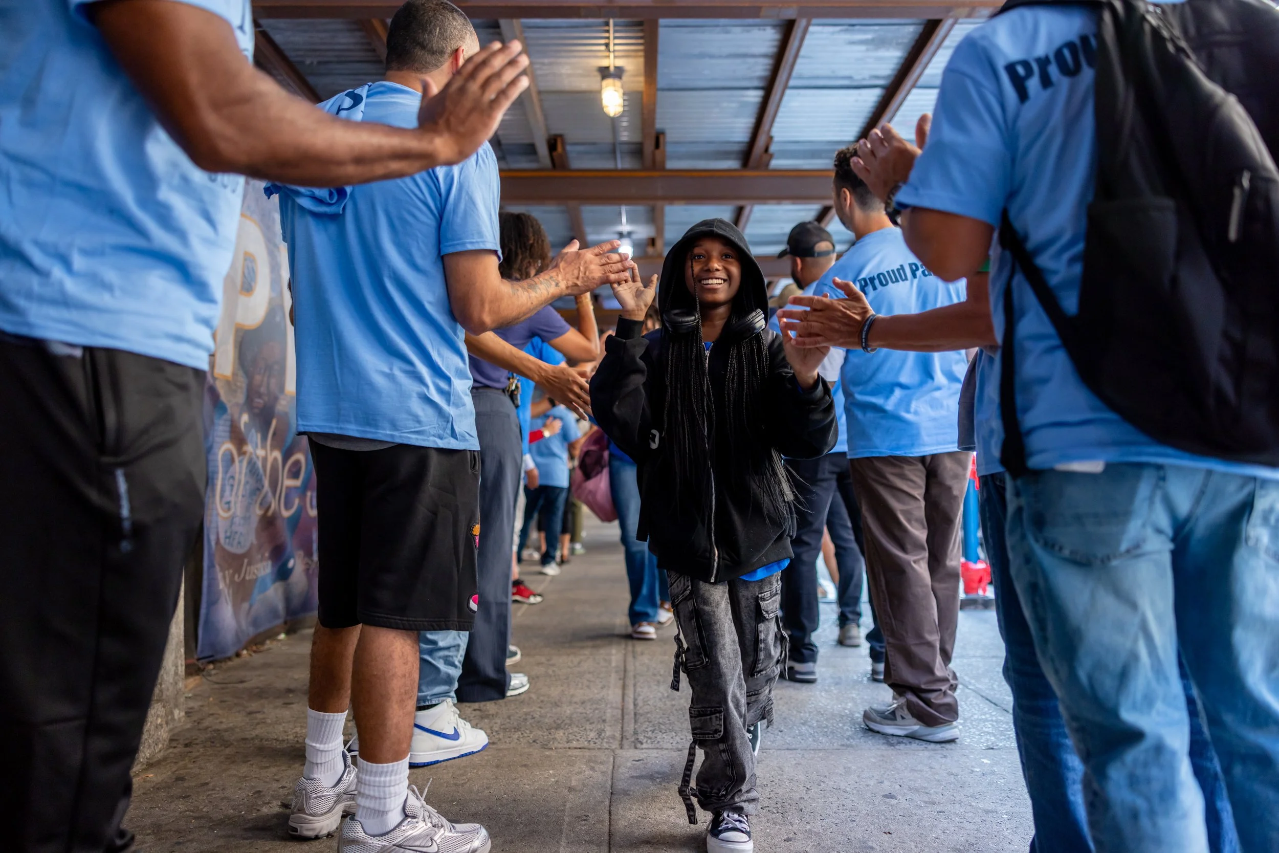 Students get high fives from parents
