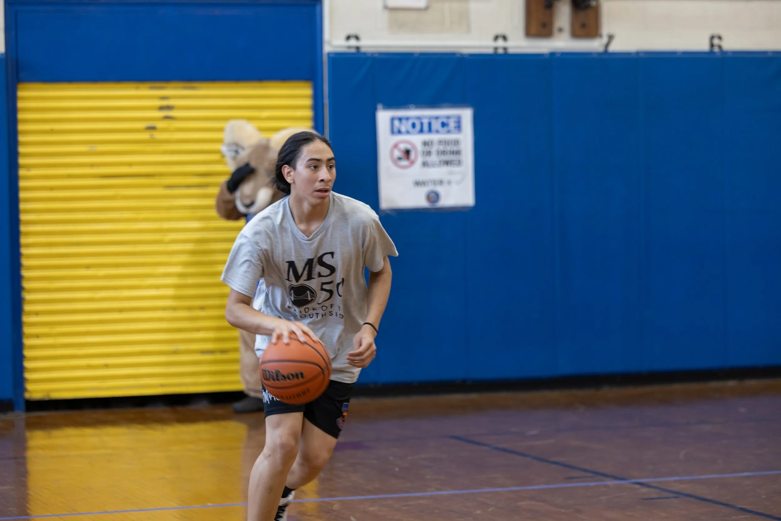 student versus staff basketball game