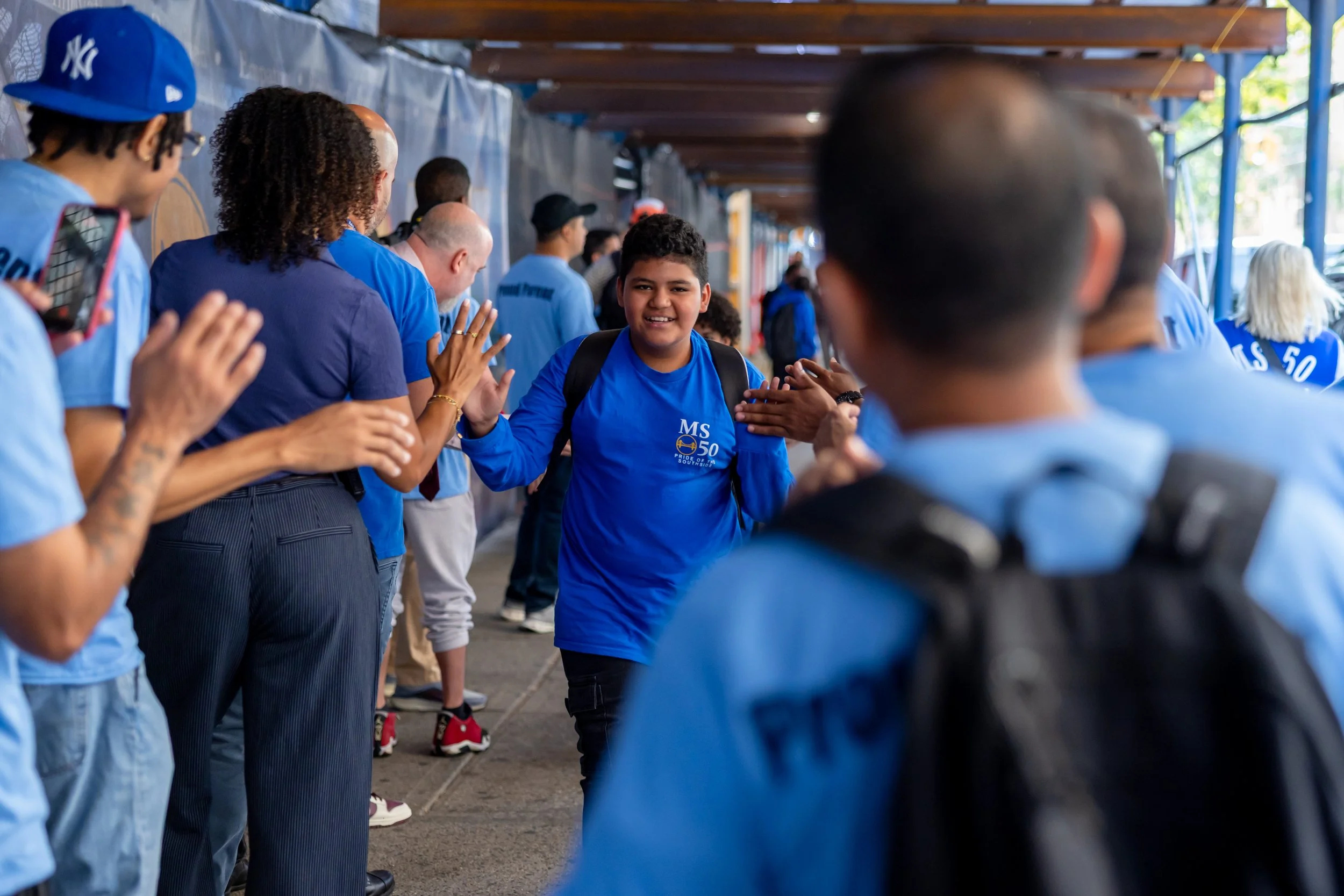 Students get high fives from parents
