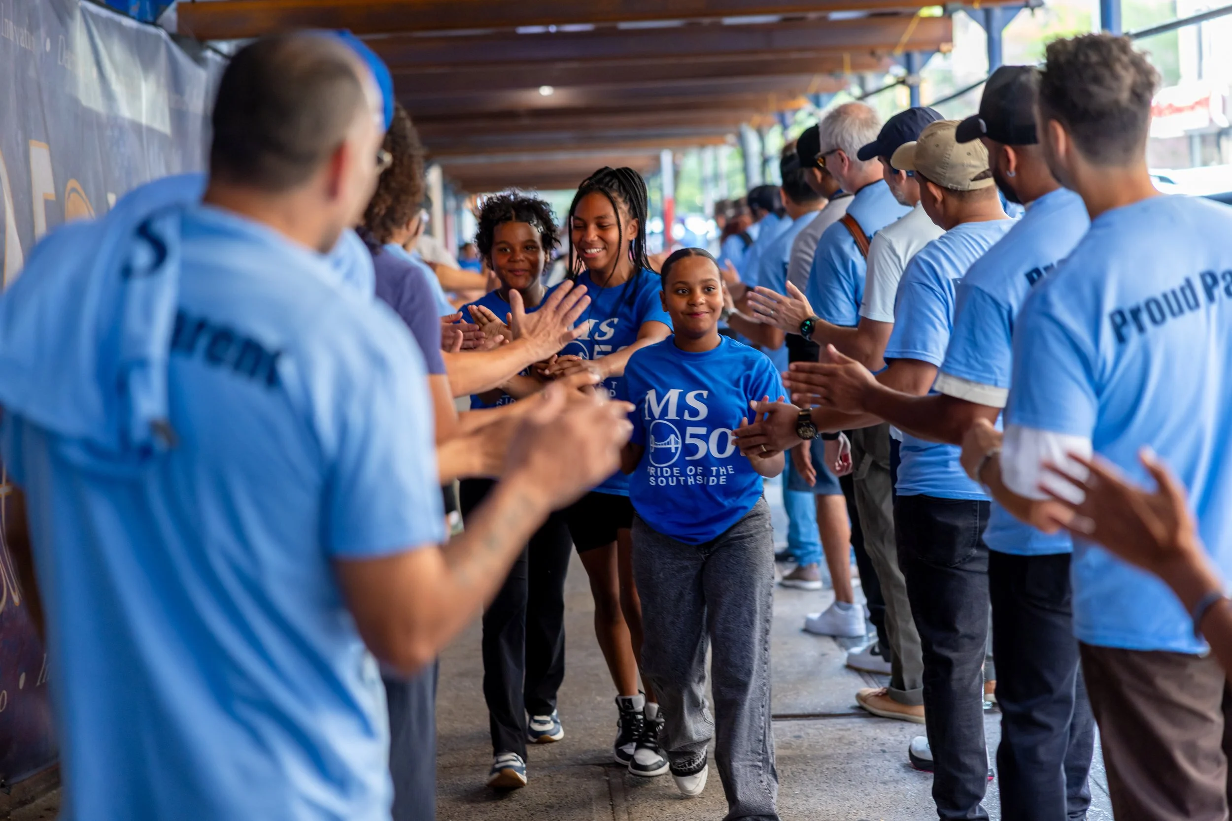 Students get high fives from parents