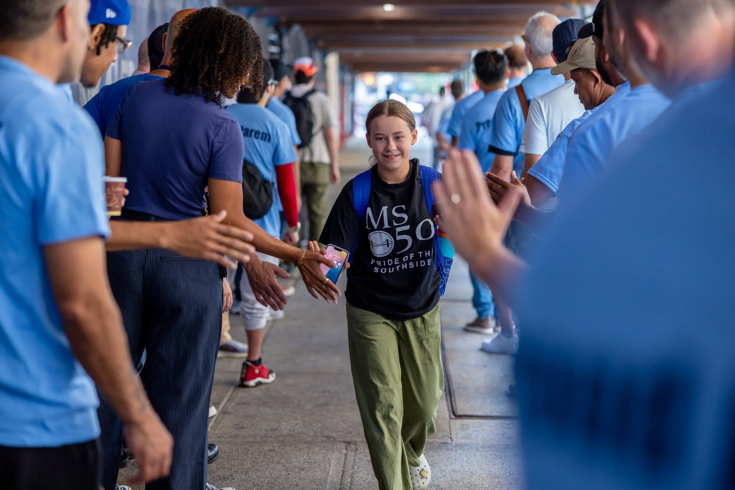 Students get high fives from parents