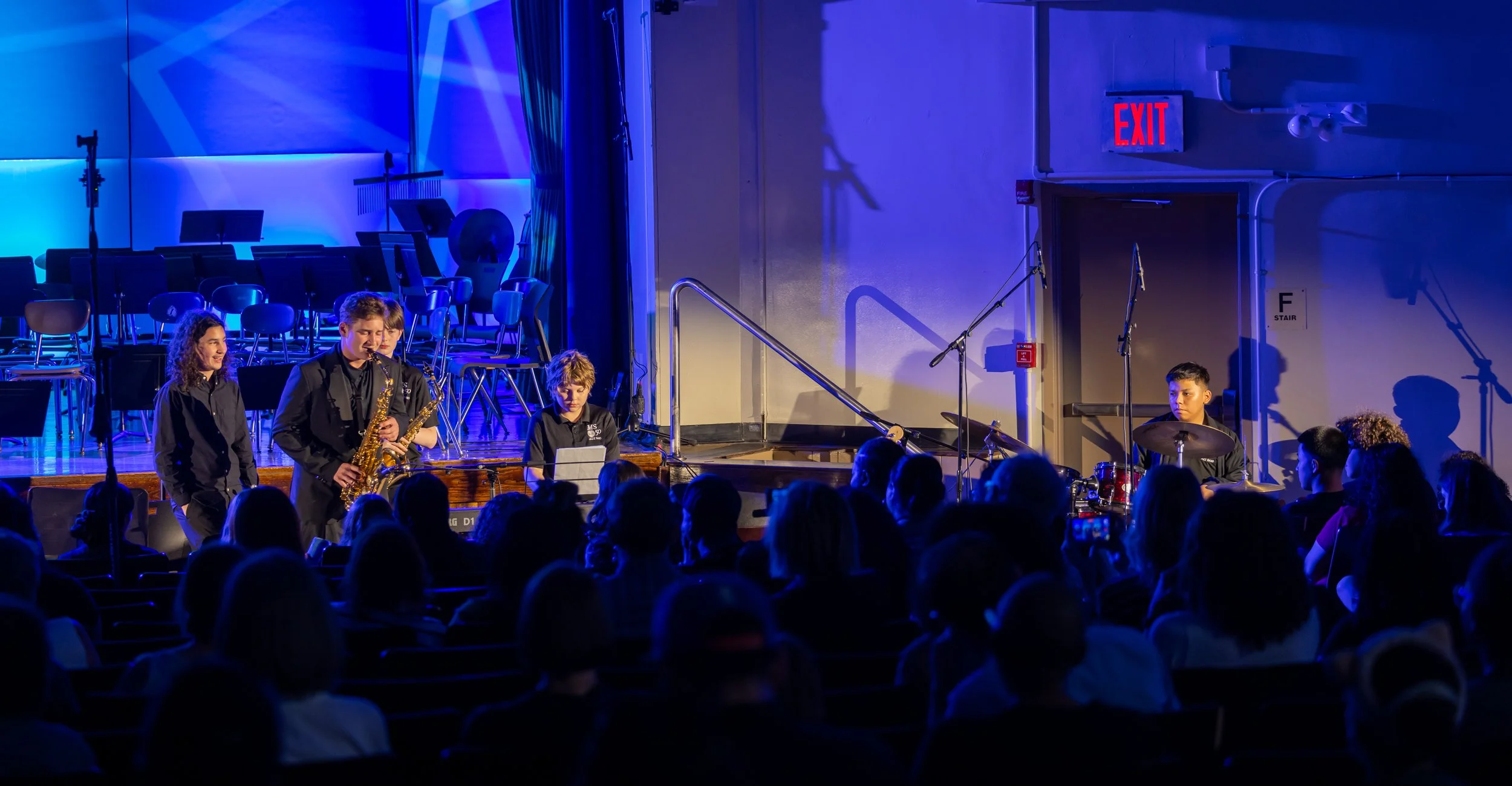 middle school students perform in band concert