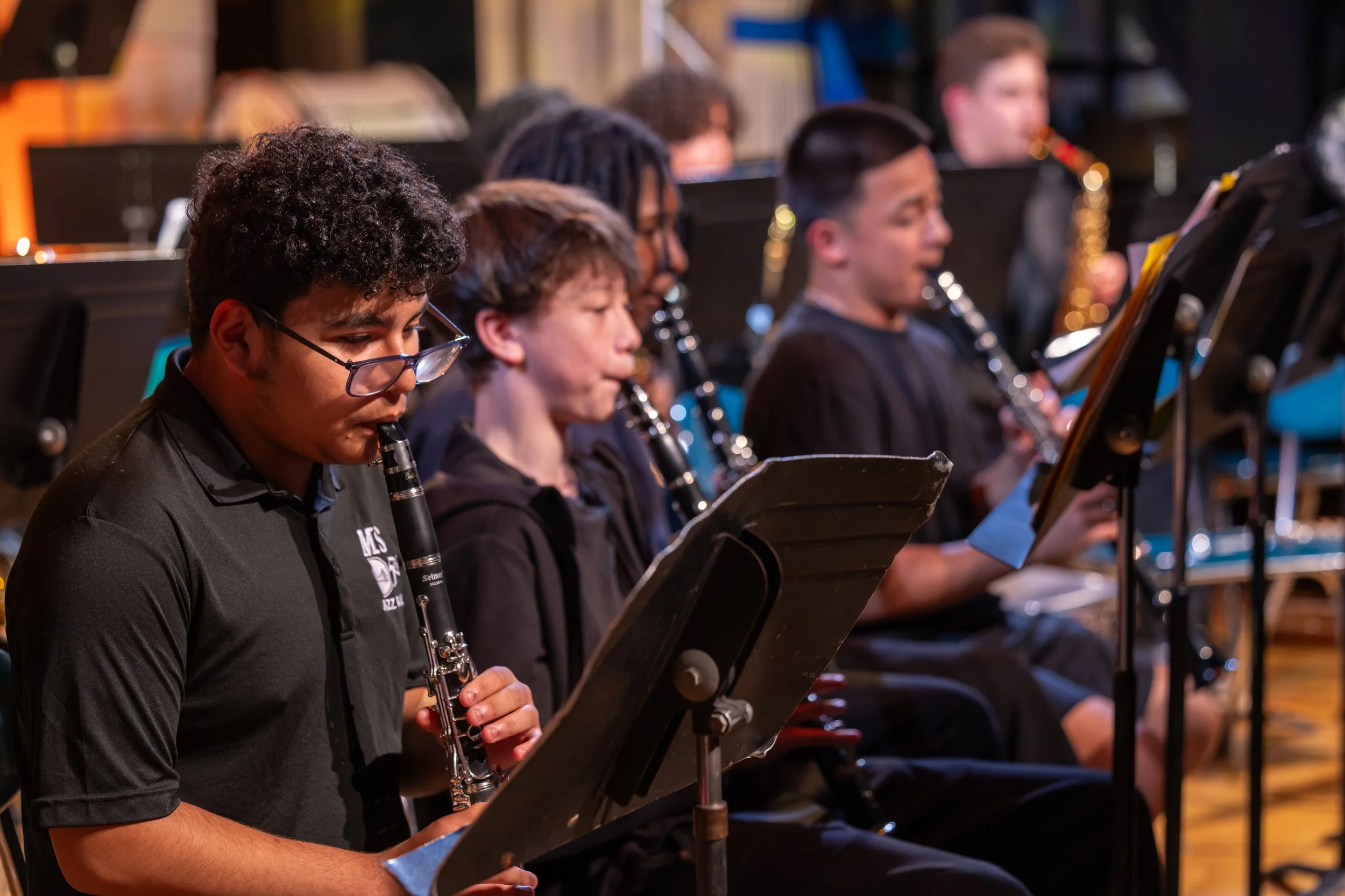 middle school students perform in band concert