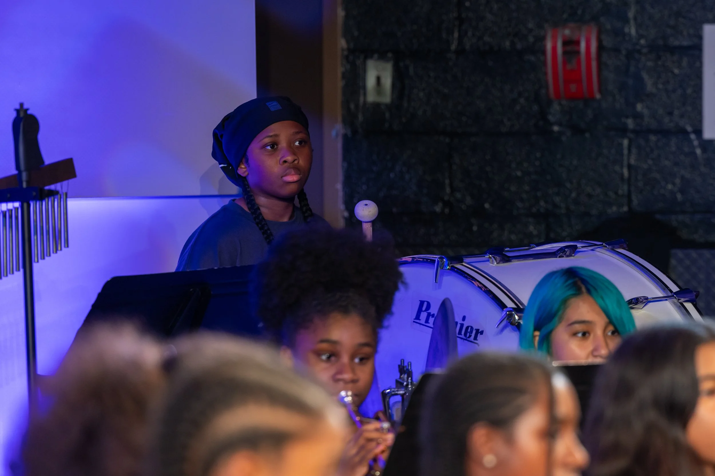 middle school students perform in band concert