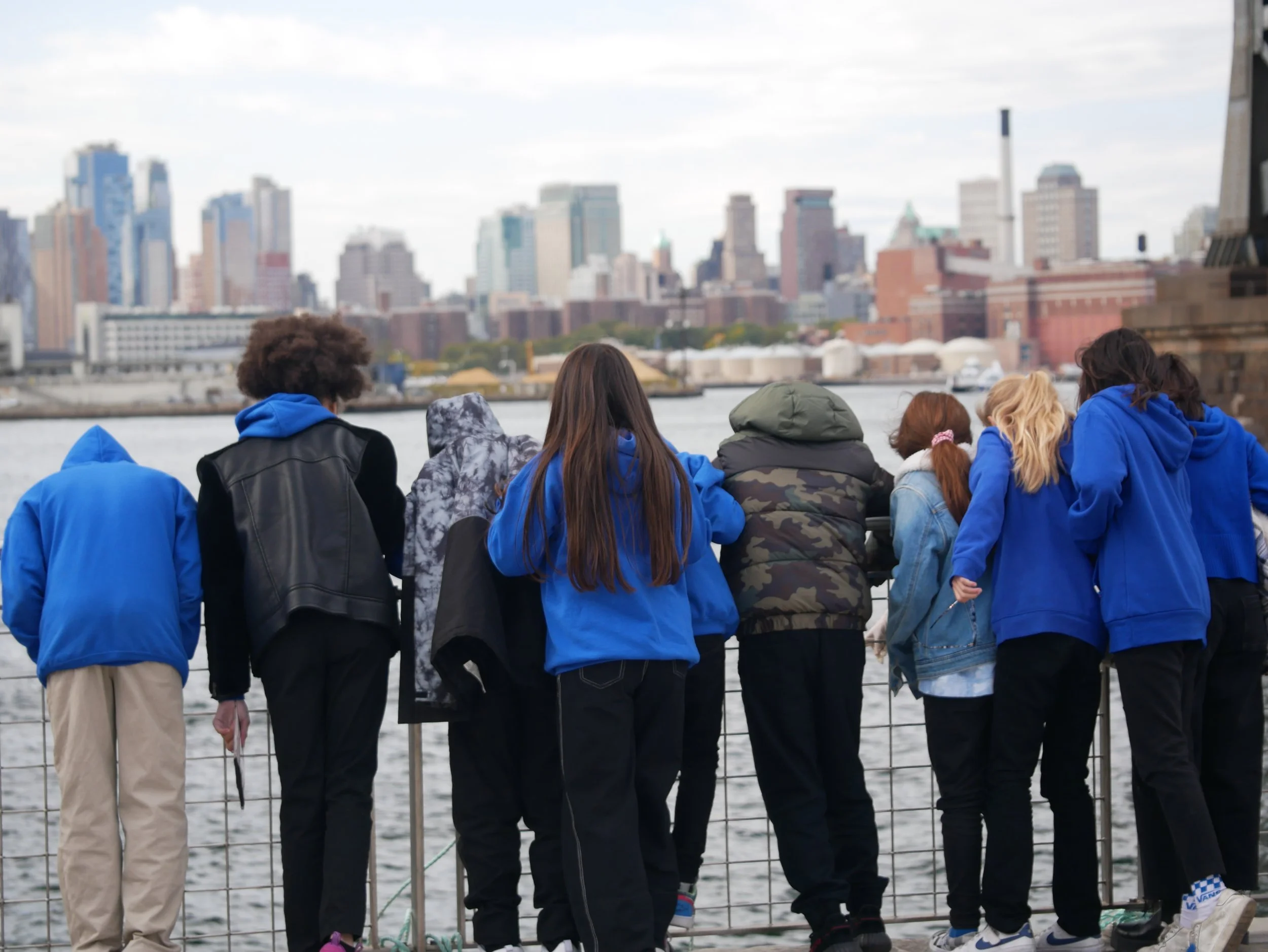 students look out into the river