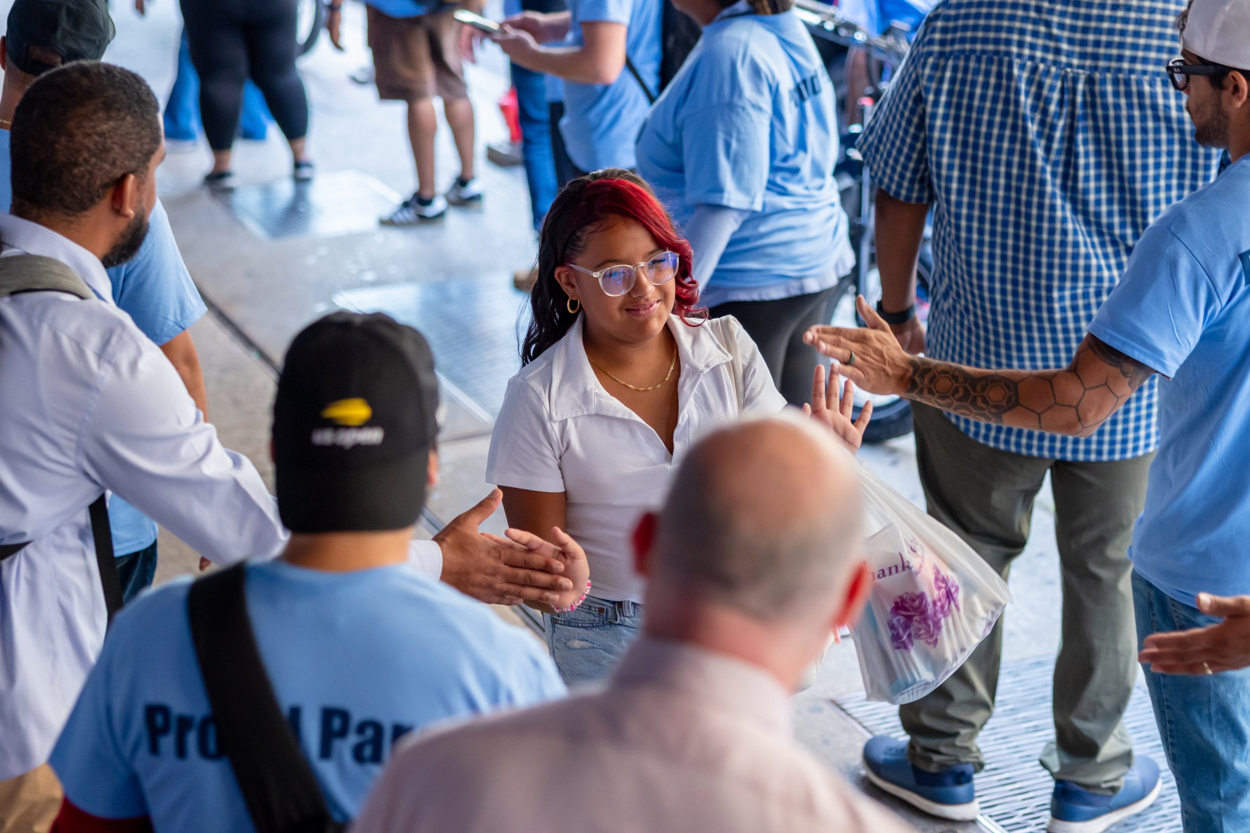 Students get high fives from parents