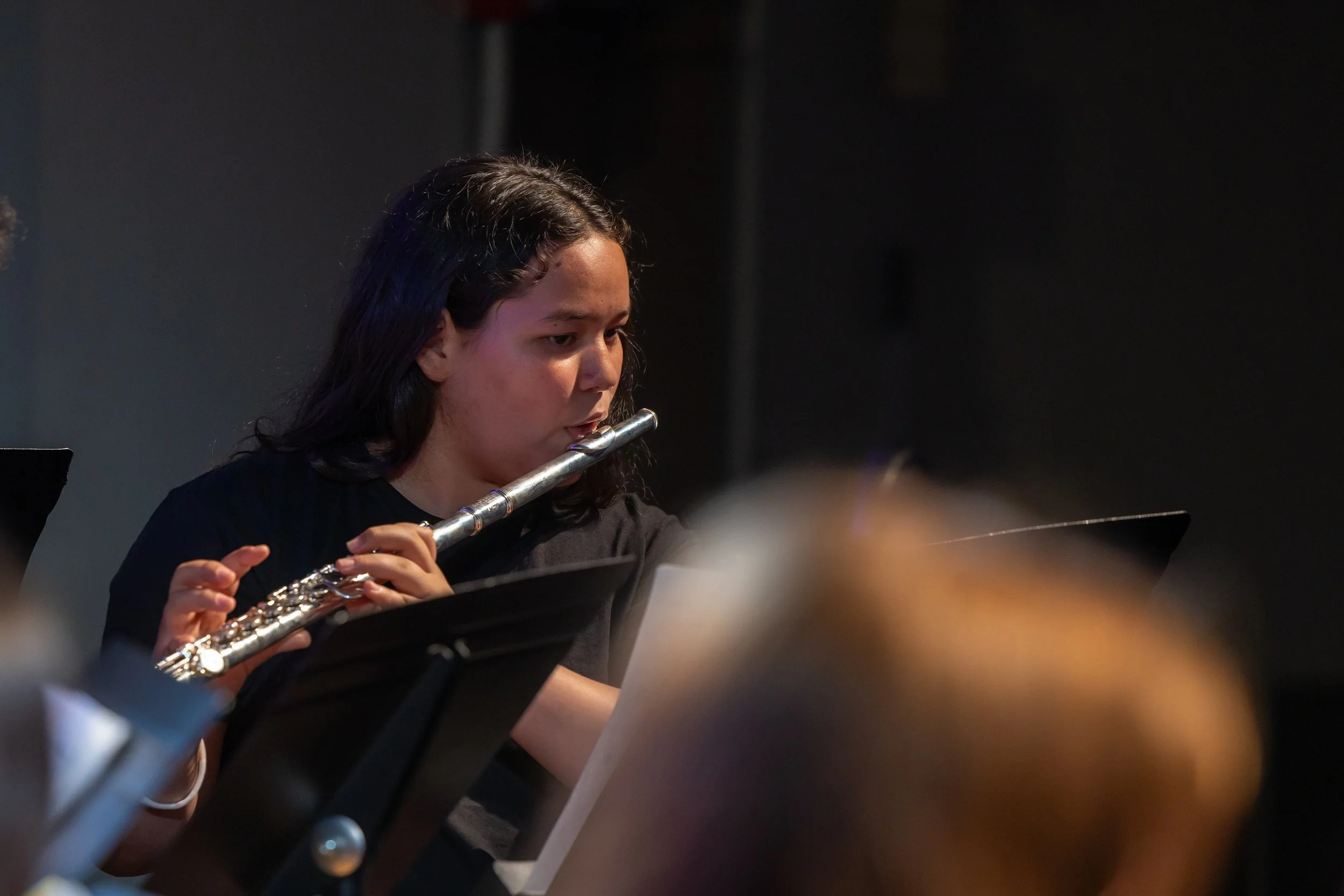 middle school students perform in band concert