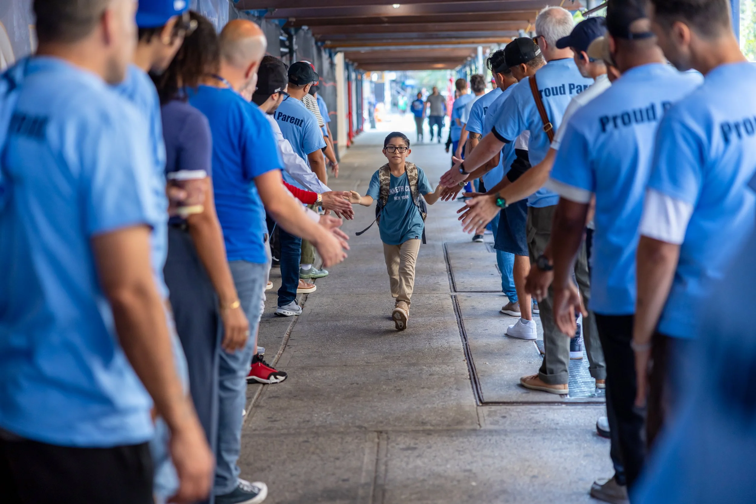 Students get high fives from parents