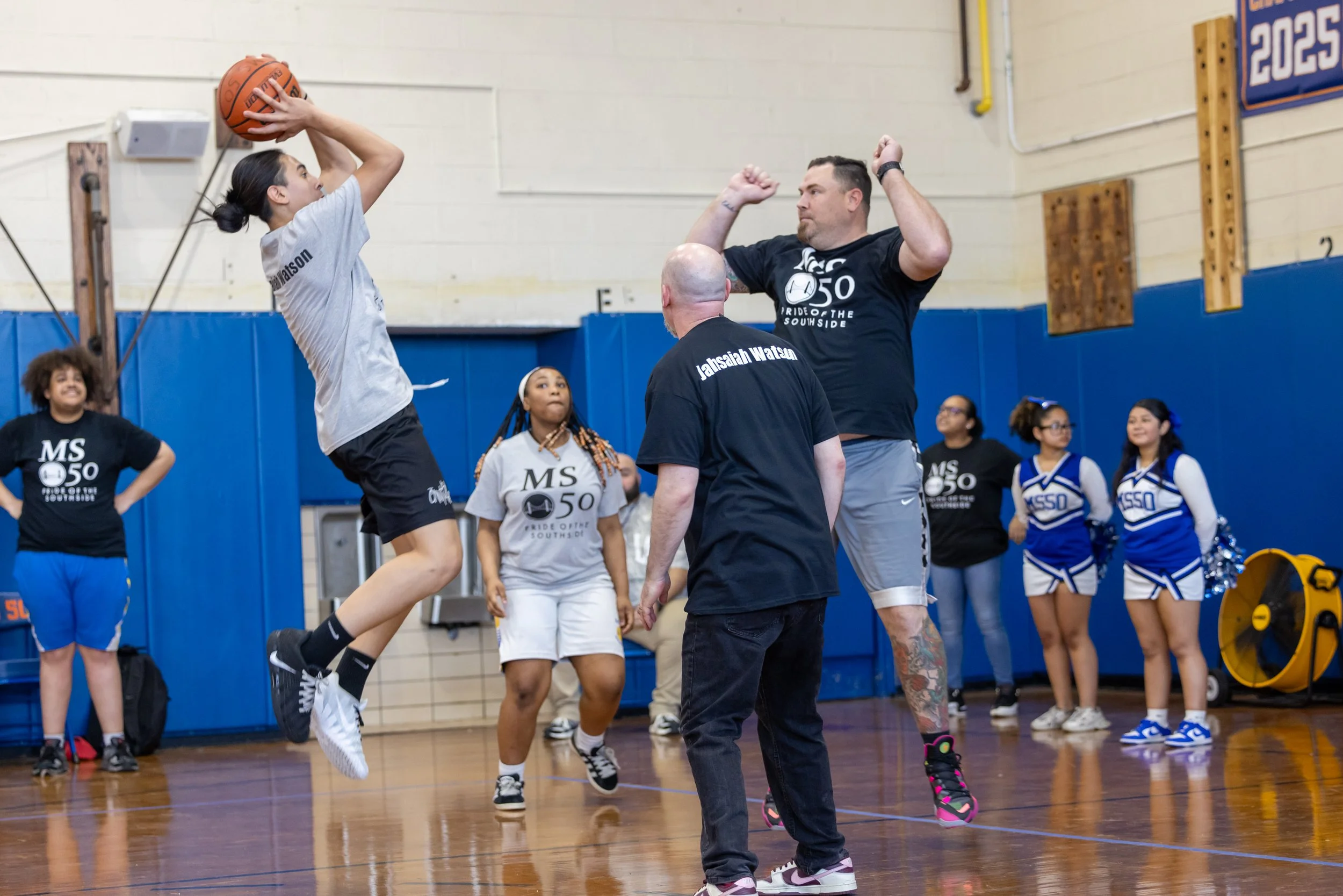 student versus staff basketball game