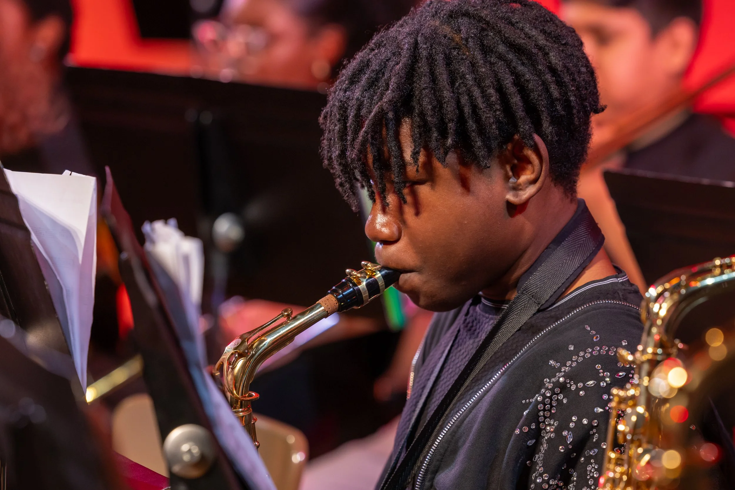 middle school students perform in band concert