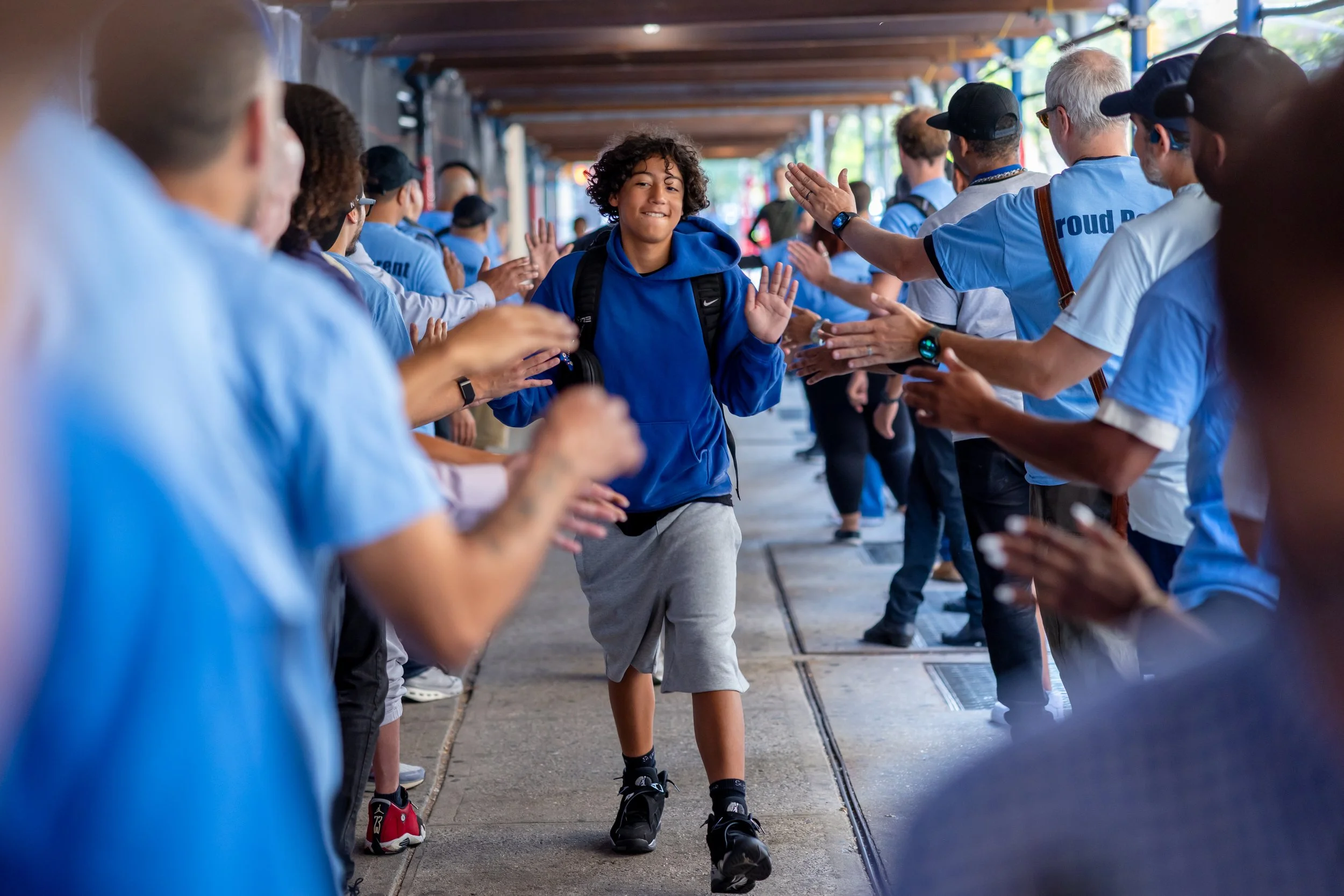 Students get high fives from parents