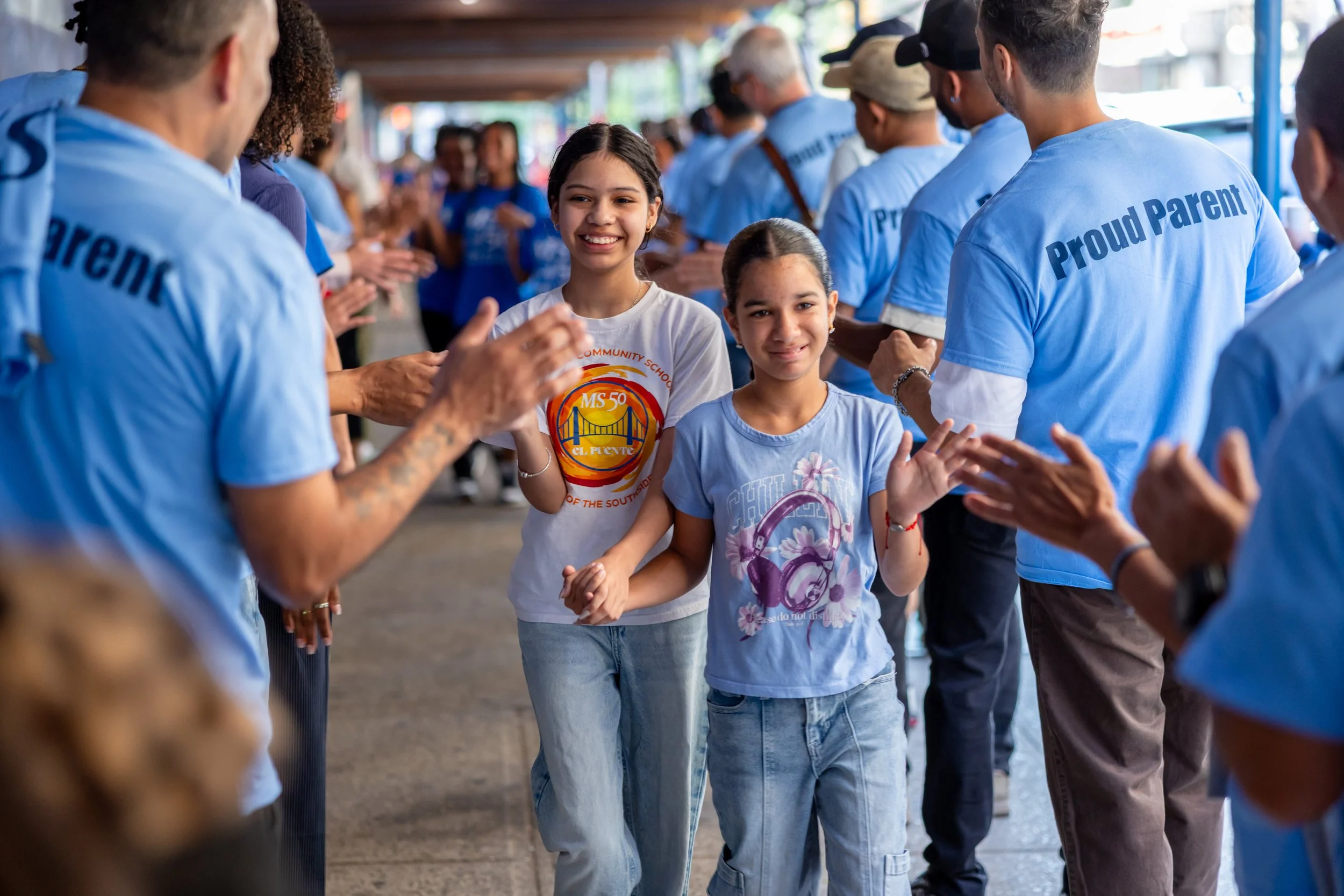 Students get high fives from parents