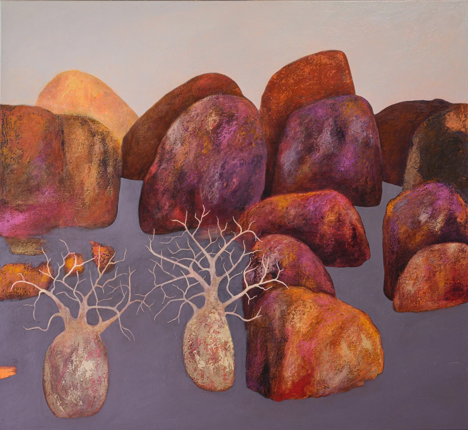 Painting of rocks in shades of purple, red, and brown with two stylized white trees with bare branches in the foreground.