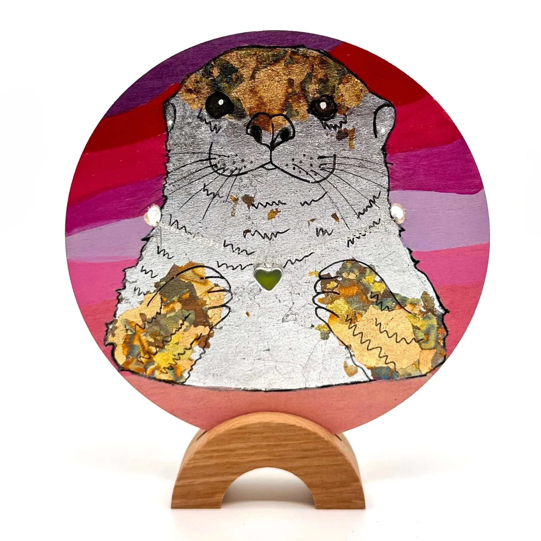 Otter - 6” dia - Acrylic, Gilded Metal Leaf and Silverstorm Jewelry 