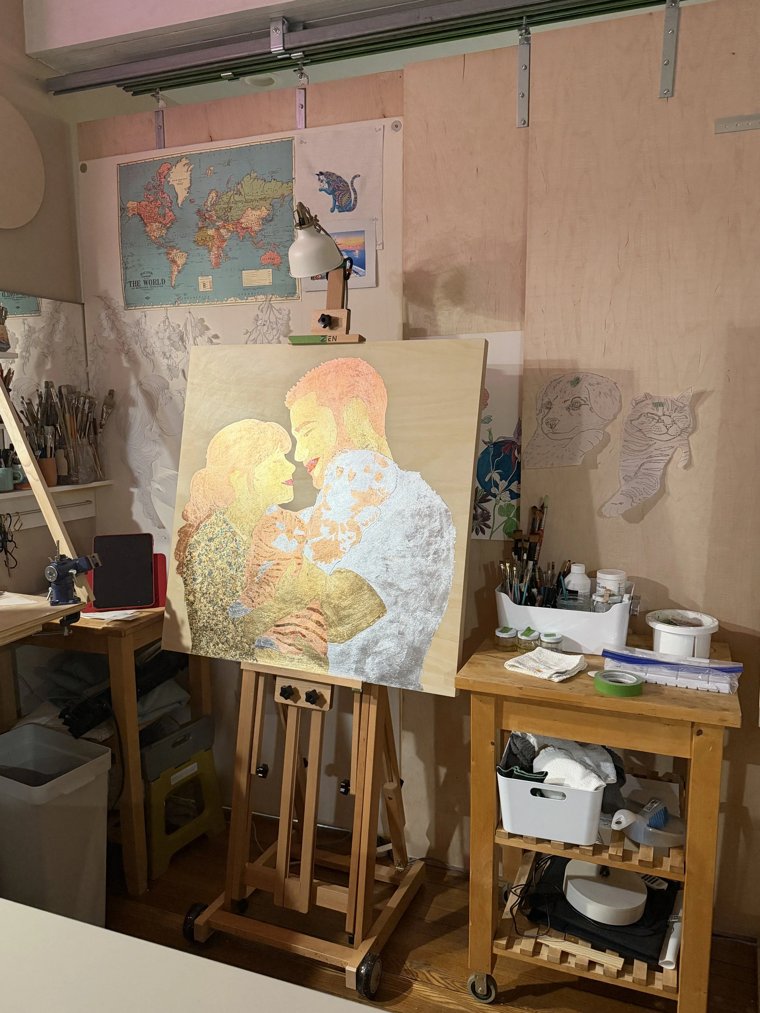 An artist's studio with a painting of a couple embracing on an easel, surrounded by art supplies, a world map, and wall sketches of animals.