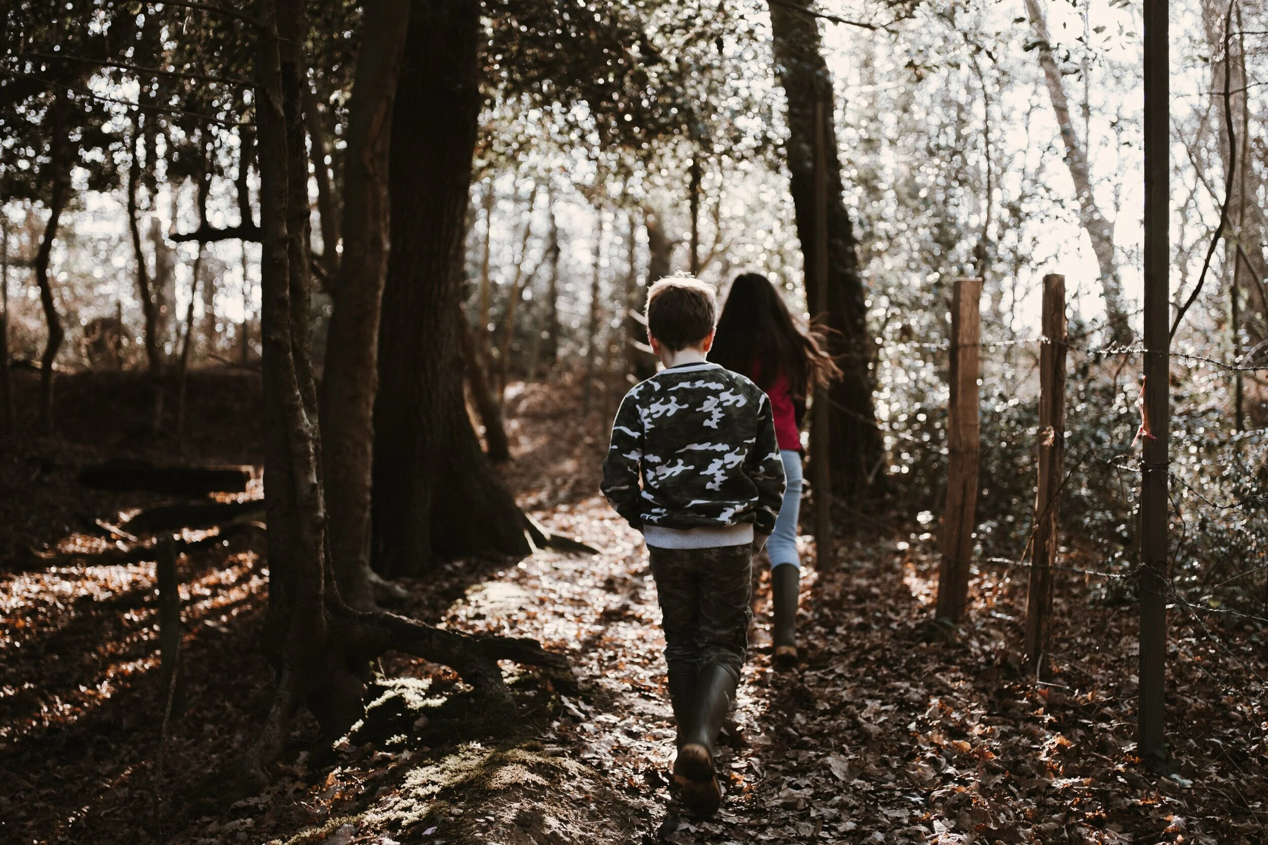 Family hiking in woods