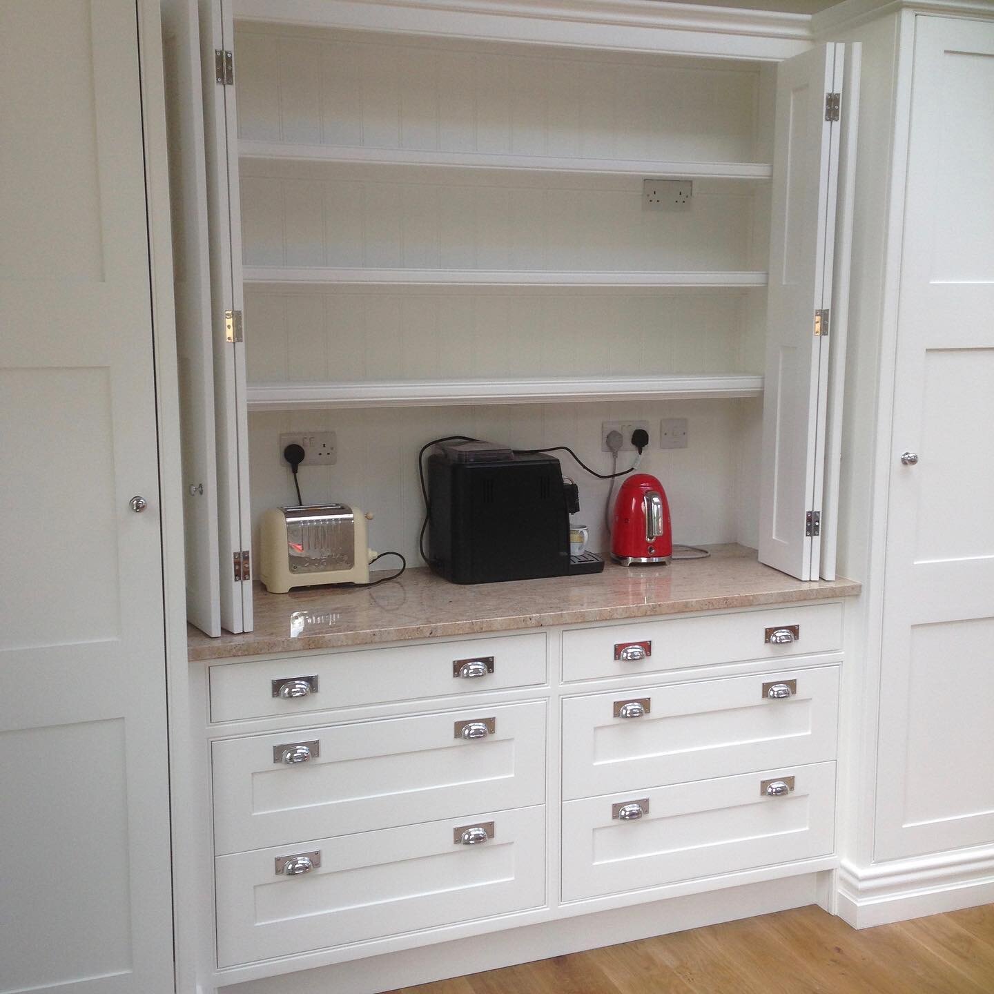 On Mondays programme of You &amp; Yours (BBC Radio 4) there was an interesting topic regarding Kitchen Garages or the more traditional term is a Dresser.  These are large storage areas to hide away any unsightly kitchen appliances.  It mentions the i