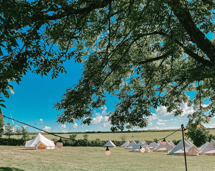 A Blank Canvas bell tent village for wedding guests