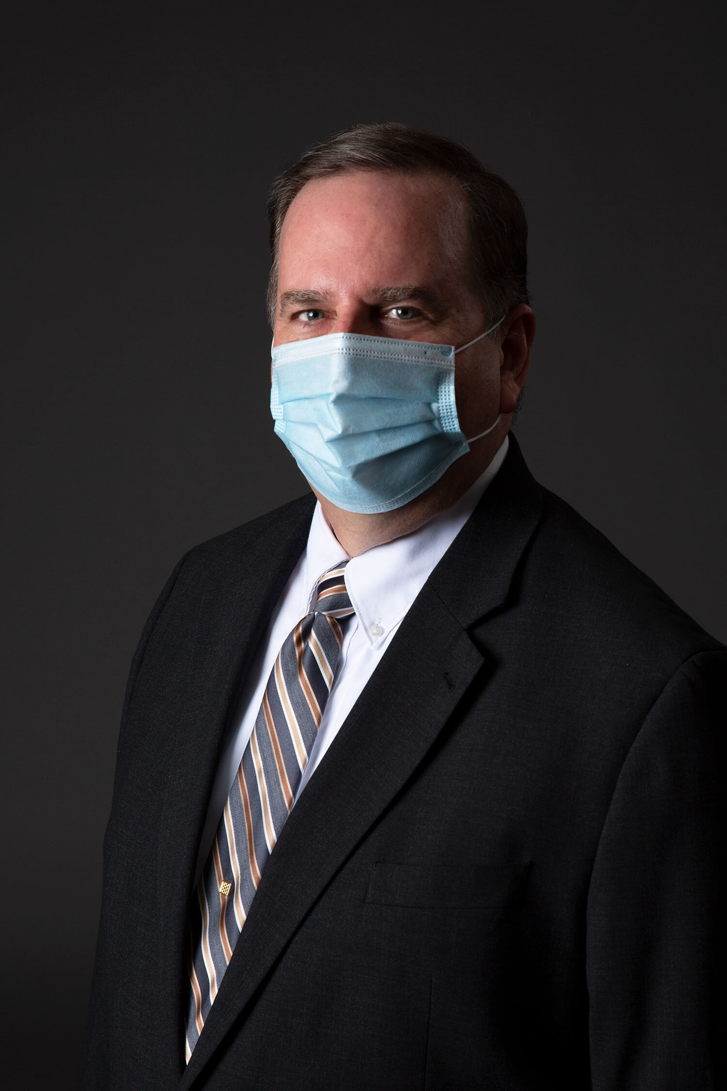 Craig Wilson CEO of Ronald McDonald House of Northeastern Ohio with mask