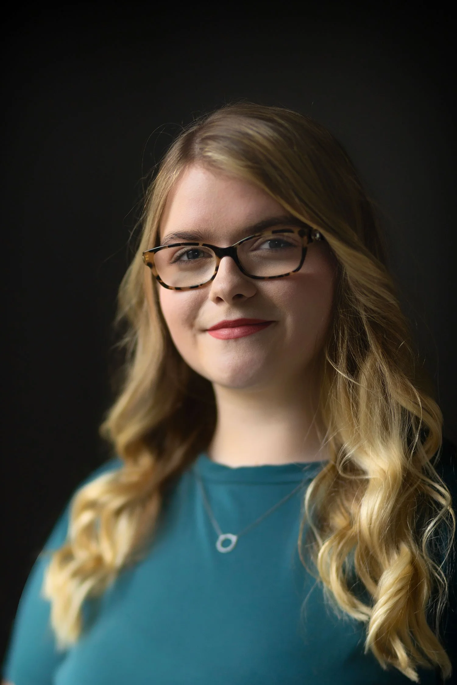 portrait of sarah bene film and production producer at one planet media