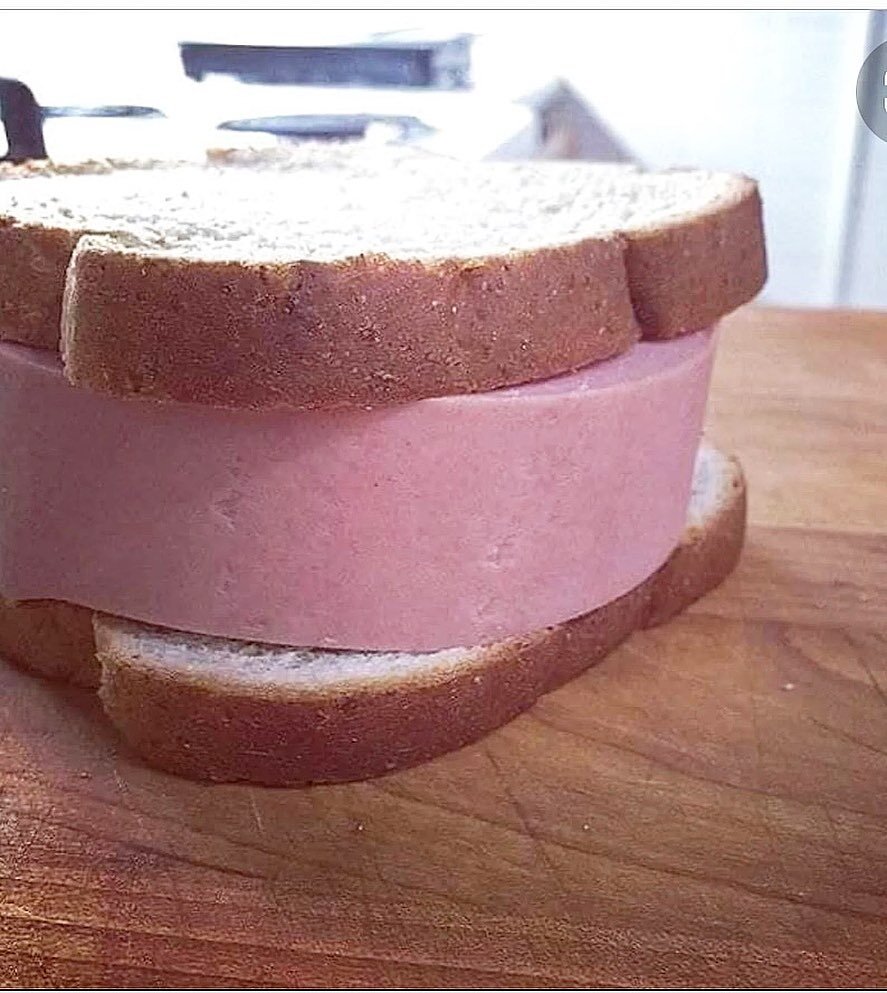 FRIED BOLOGNA SANDWICH IS STILL HERE AND IT DOESNT LOOK LIKE THIS BUT THIS STILL LOOKS COOL BECAUSE ITS A BIG ASS BOLOGNA.  FUCK AROUND AND GET FED.