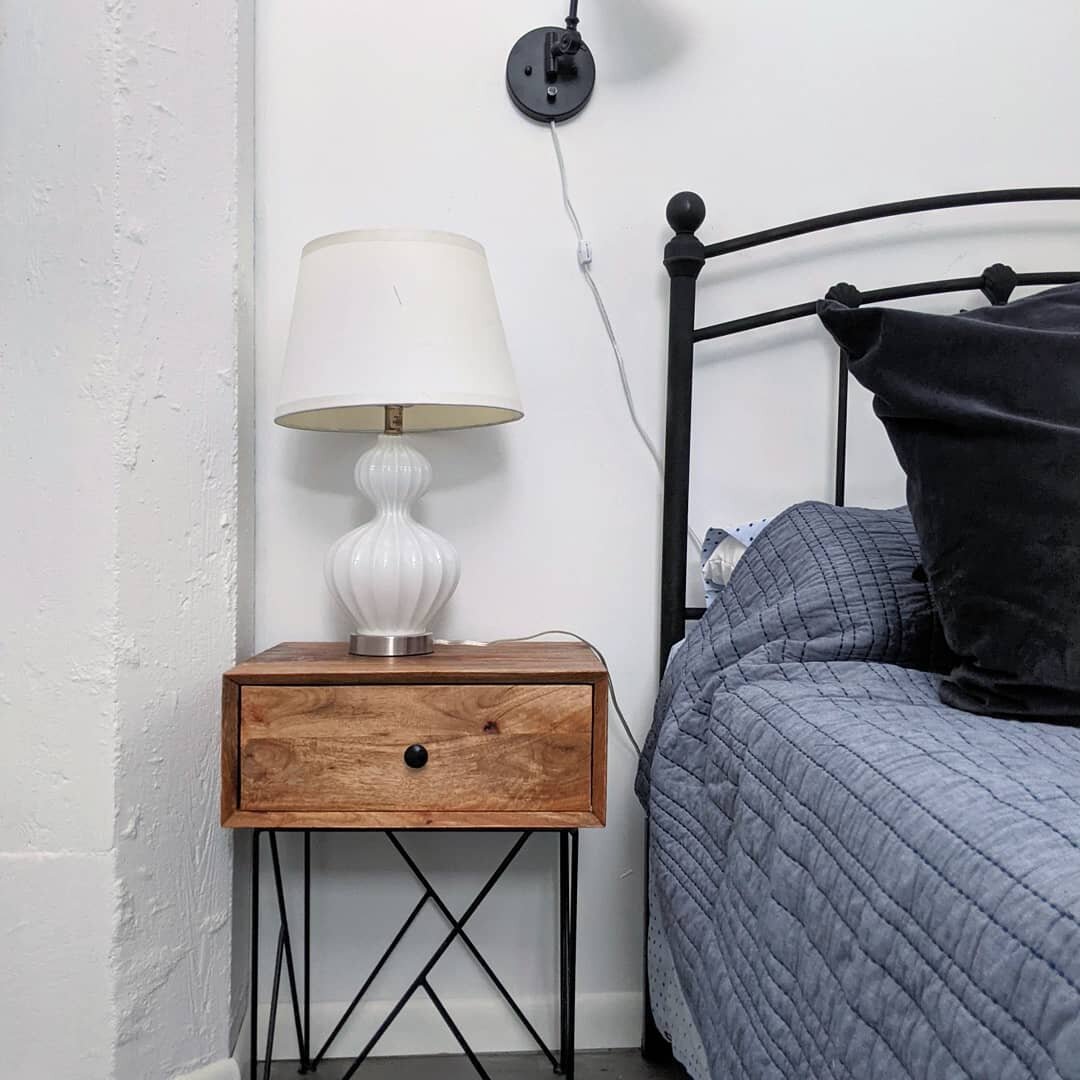 The bedroom in Sienna is accented by the shoji room storage space above it.

It features an en suite bathroom and a walk-in closet.

This downtown Denver apartment comes fully furnished for easy move in. The apartment has an indoor parking spot, stor