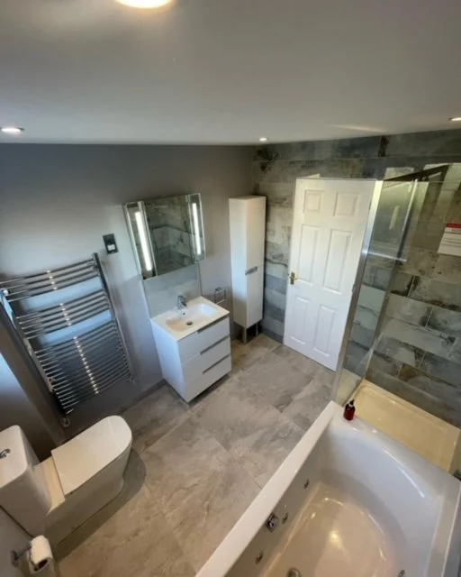 Beautiful, bathroom remodel including,  plastering and tiling. services.