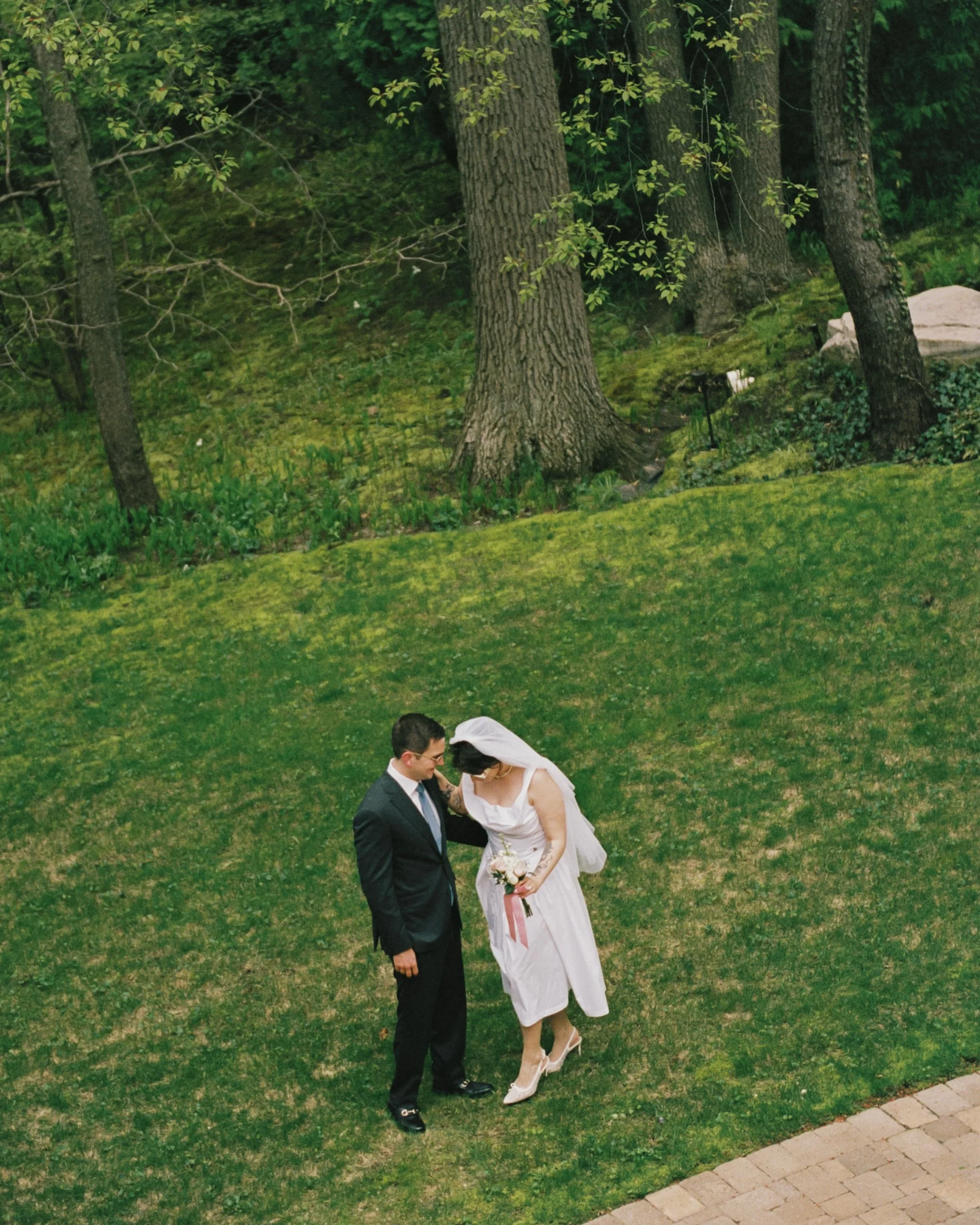 Amelia + Alex, making it official at Alex&rsquo;s childhood home, on film. Precious vintage-y goodness 🫶

~
~
~

Toronto wedding photographer 
weddings on film 
Italy wedding photographer
