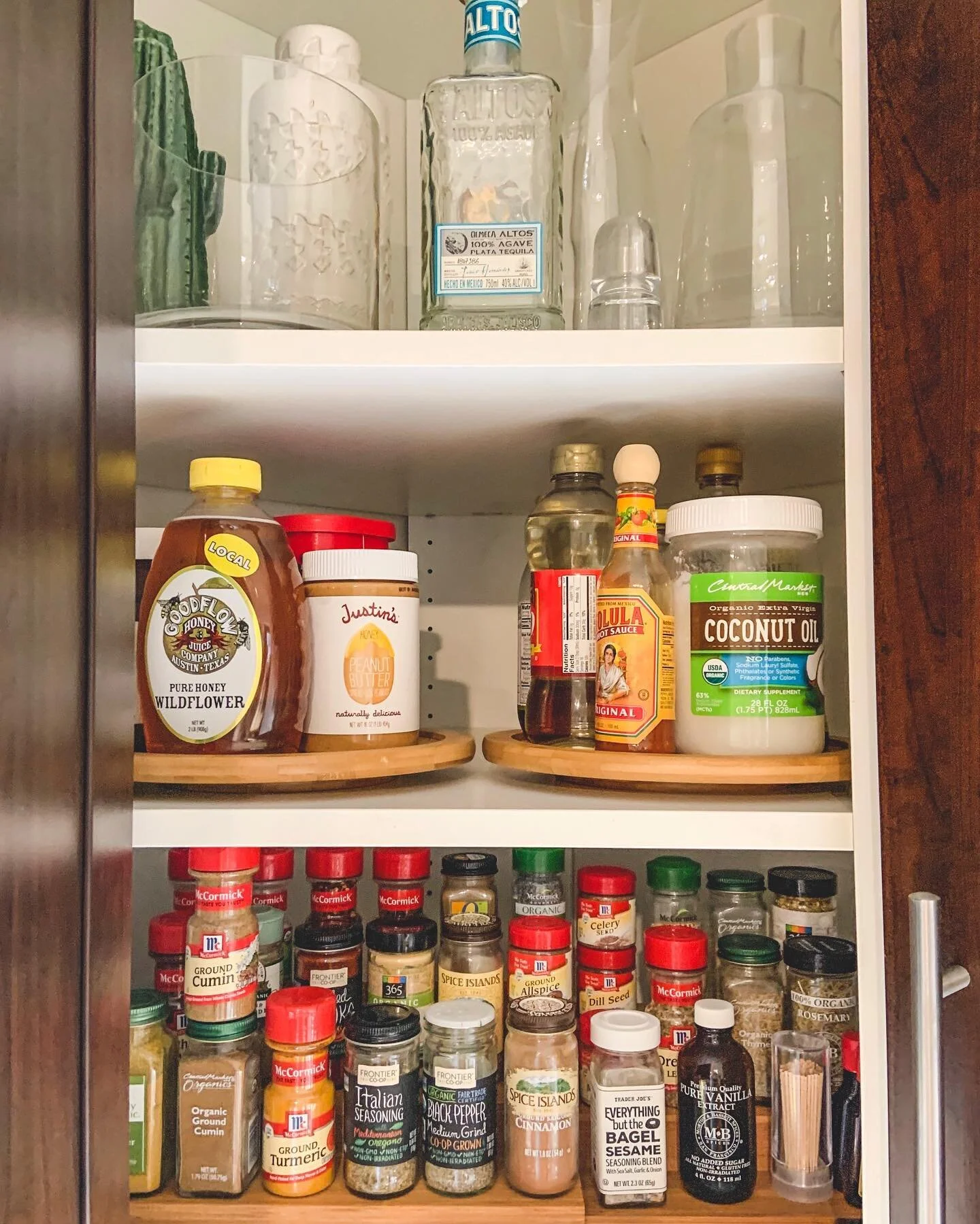 Although matching spice jars are gorgeous, not every client is in a place to purchase all new containers at once. If this is you, consider purchasing a few jars each time you run out of spices or as they expire. Buying spices in the bulk section is o