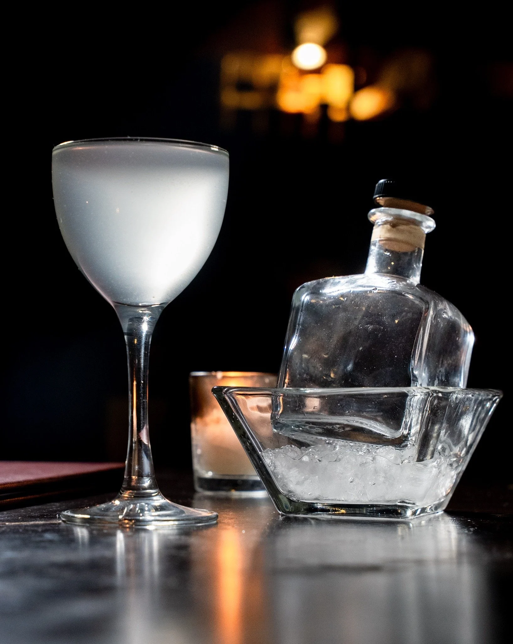 The Hidden Speakeasy Near Boston You Need to Visit: Less Than Greater Than 🍸