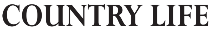 Text that reads 'COUNTRY LIFE' in large, dark purple letters on a black background.
