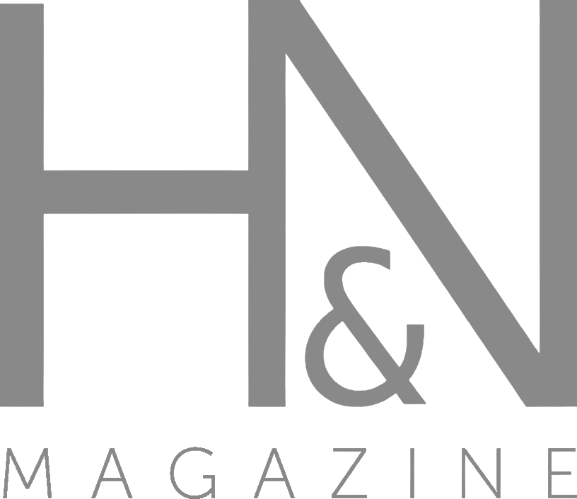 Logo of H&N Magazine featuring stylized black and gray geometric shapes with the name 'H&N MAGAZINE' below.