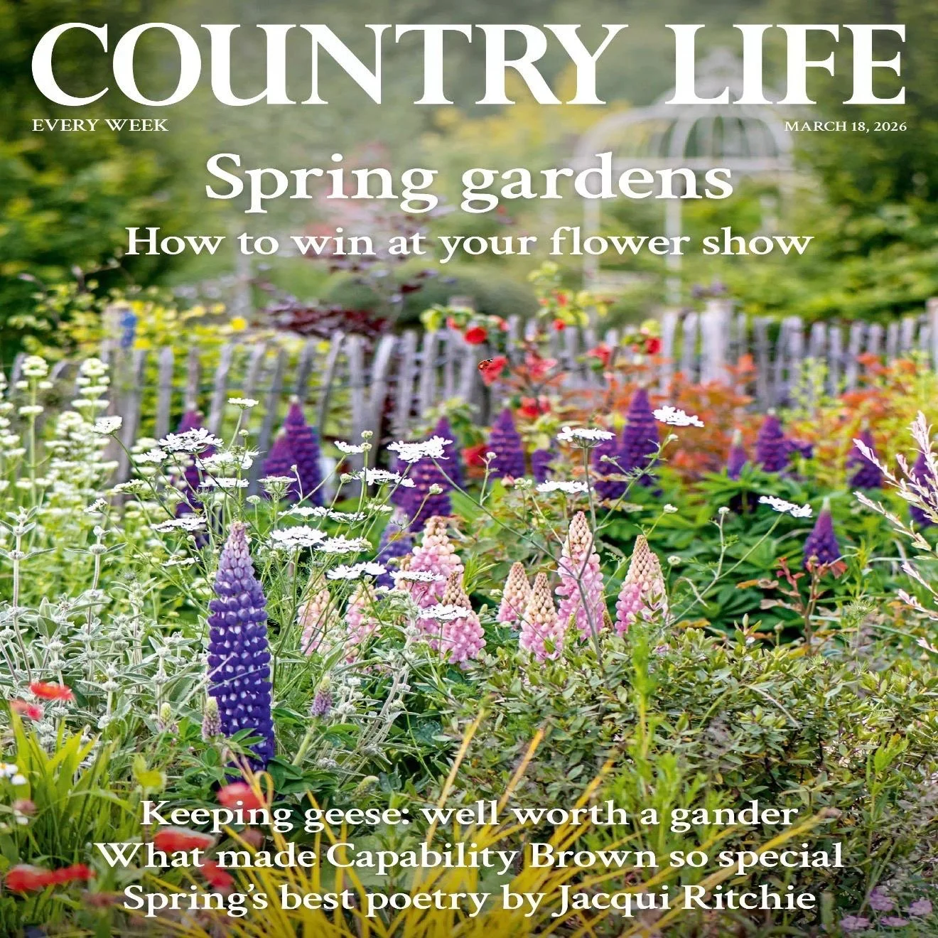 Cover of 'Country Life' magazine featuring a vibrant spring garden with blooming flowers, a white picket fence, and a greenhouse in the background, dated March 18, 2026.