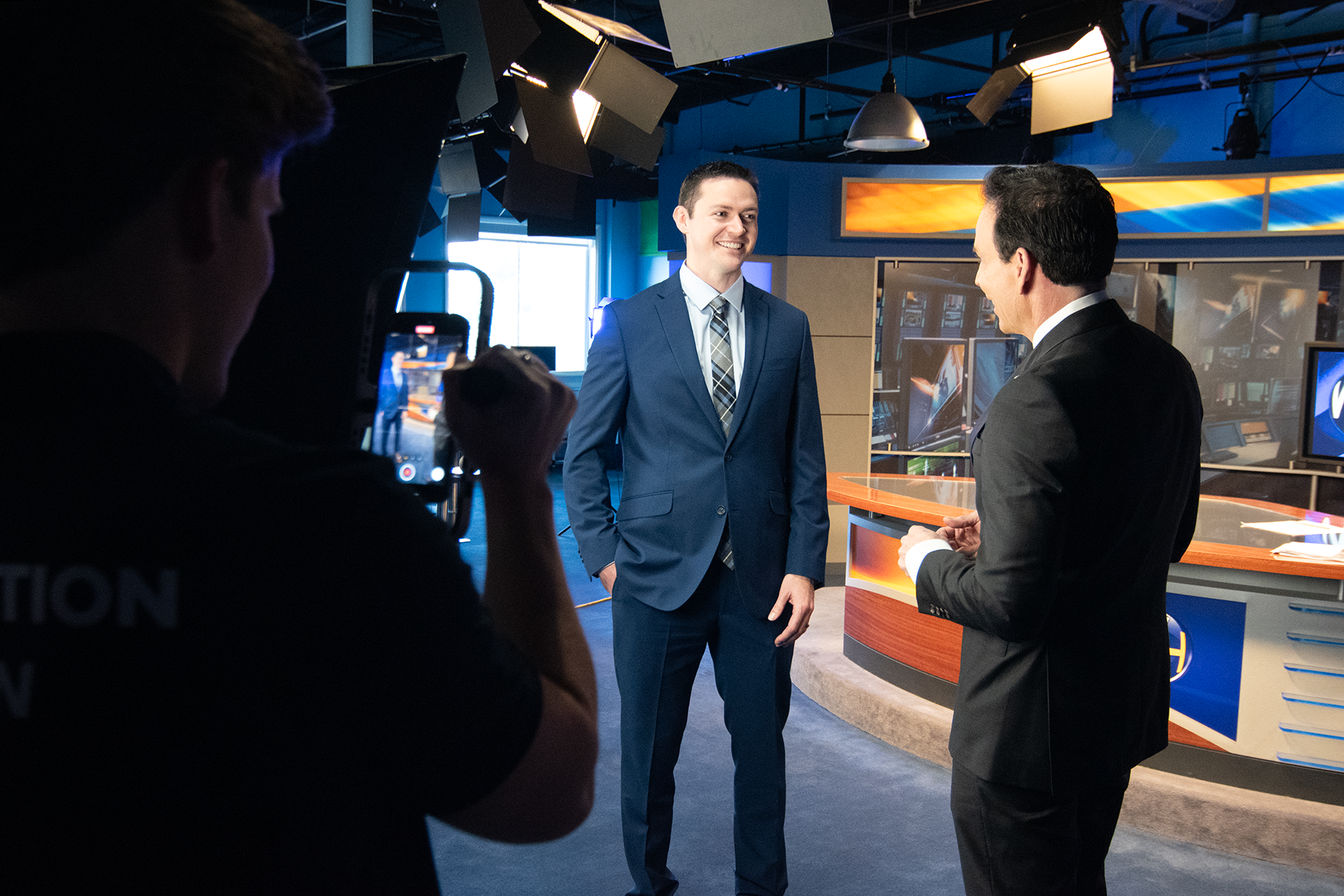Client testimonial being filmed with Randy Alvarez at The Wellness Hour Newsroom