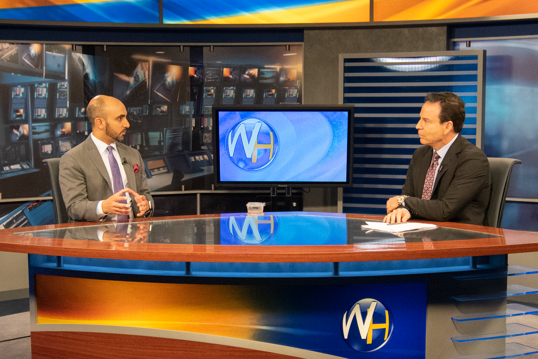 Dr. Taher Dhoon with Randy Alvarez at The Wellness Hour Newsroom in Carlsbad, California
