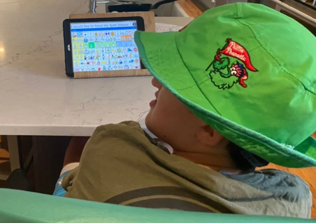 Host Child Care Professional Tanja with AAC Device