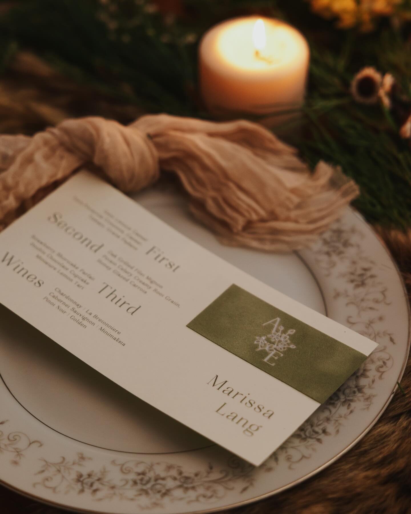 A moody winter tablescape. White Foil on sage velvet menu card. Sage green ink. Beautiful photo by @sageriver_studios 

#weddinginspiration #weddingmenu #weddinginvitations