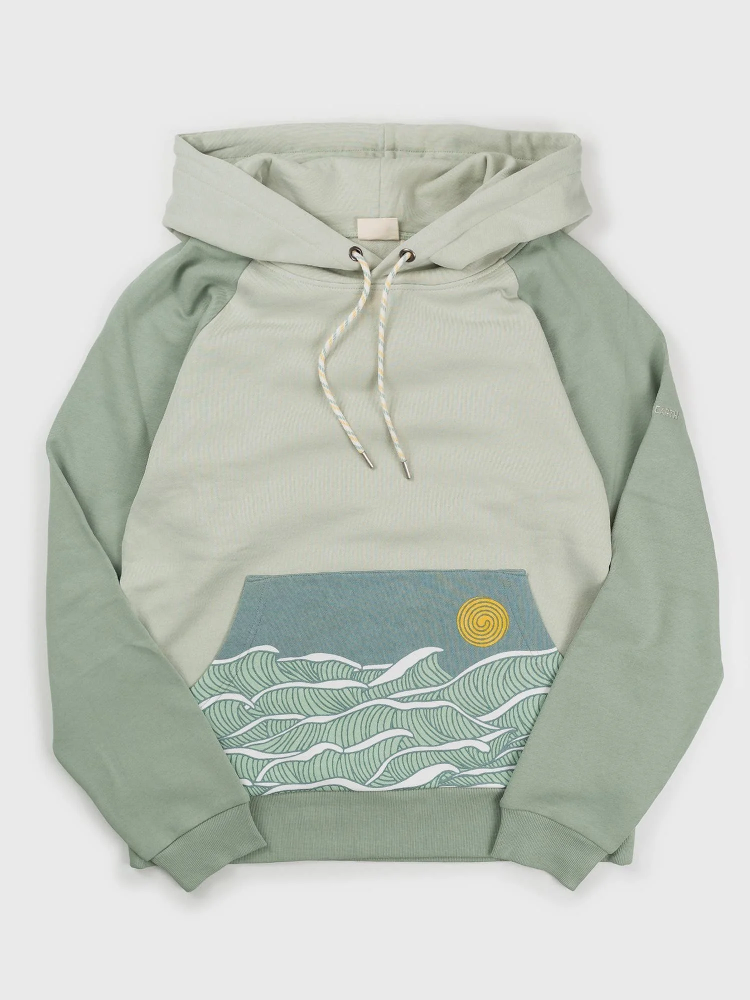 Happy Earth Beach Break Hoodie is made from 100% GOTs cotton and has the graphic of waves and the sun on a sage green ground.