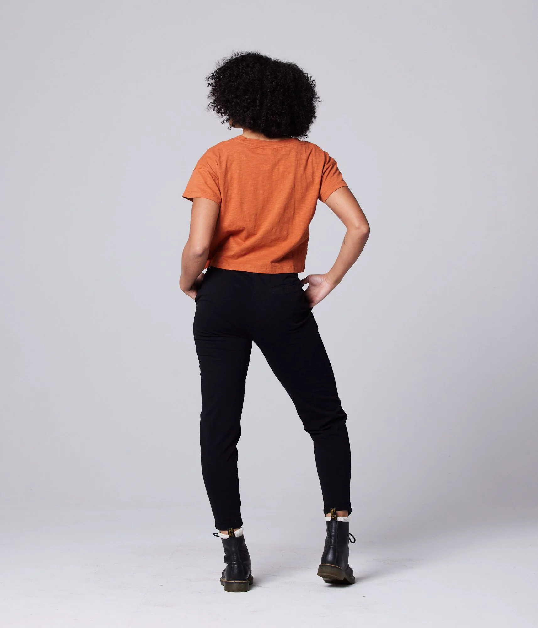 Known Supply 100% GOTs certified Organic cotton short sleeved Easy Crop Tee in the color rust