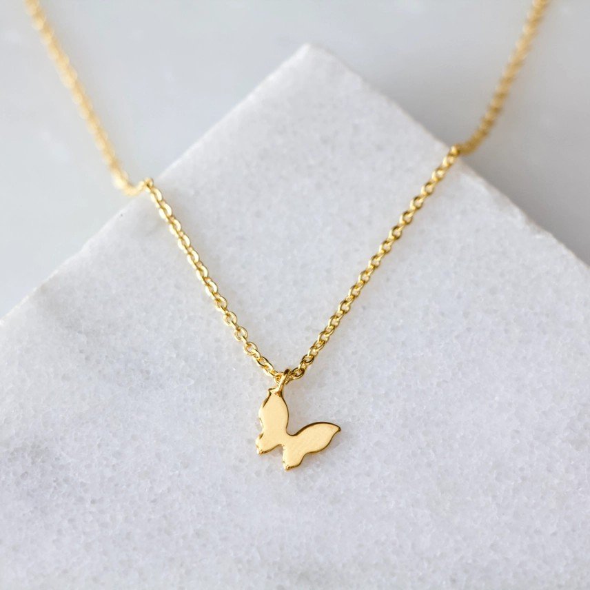 Mesa Blue Mini Butterfly charm on a 18k gold plated chain