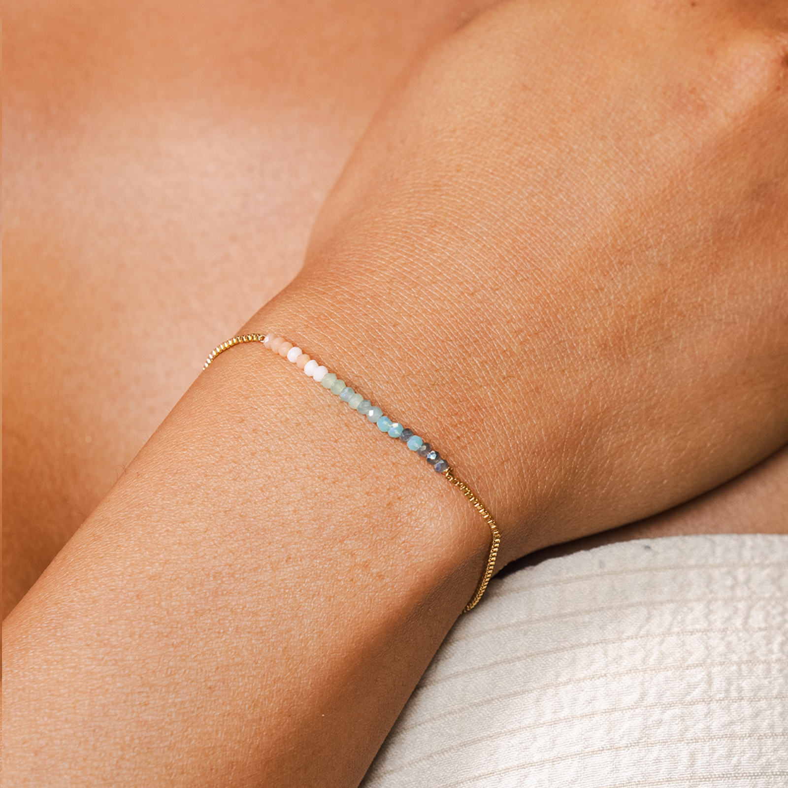 Lotus and Luna Create Your Own Sunshine Goddess Bracelet with Orange, Cream, Mint, Blue, Navy beading