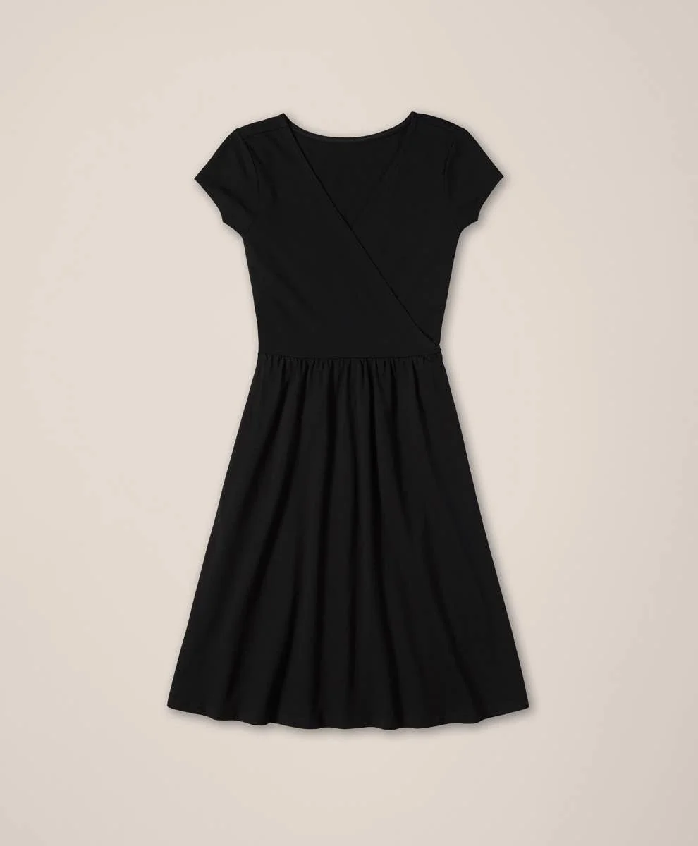 Pact 100% GOTs Cotton Fit & Flare Crossover Dress with short sleeves in the color black